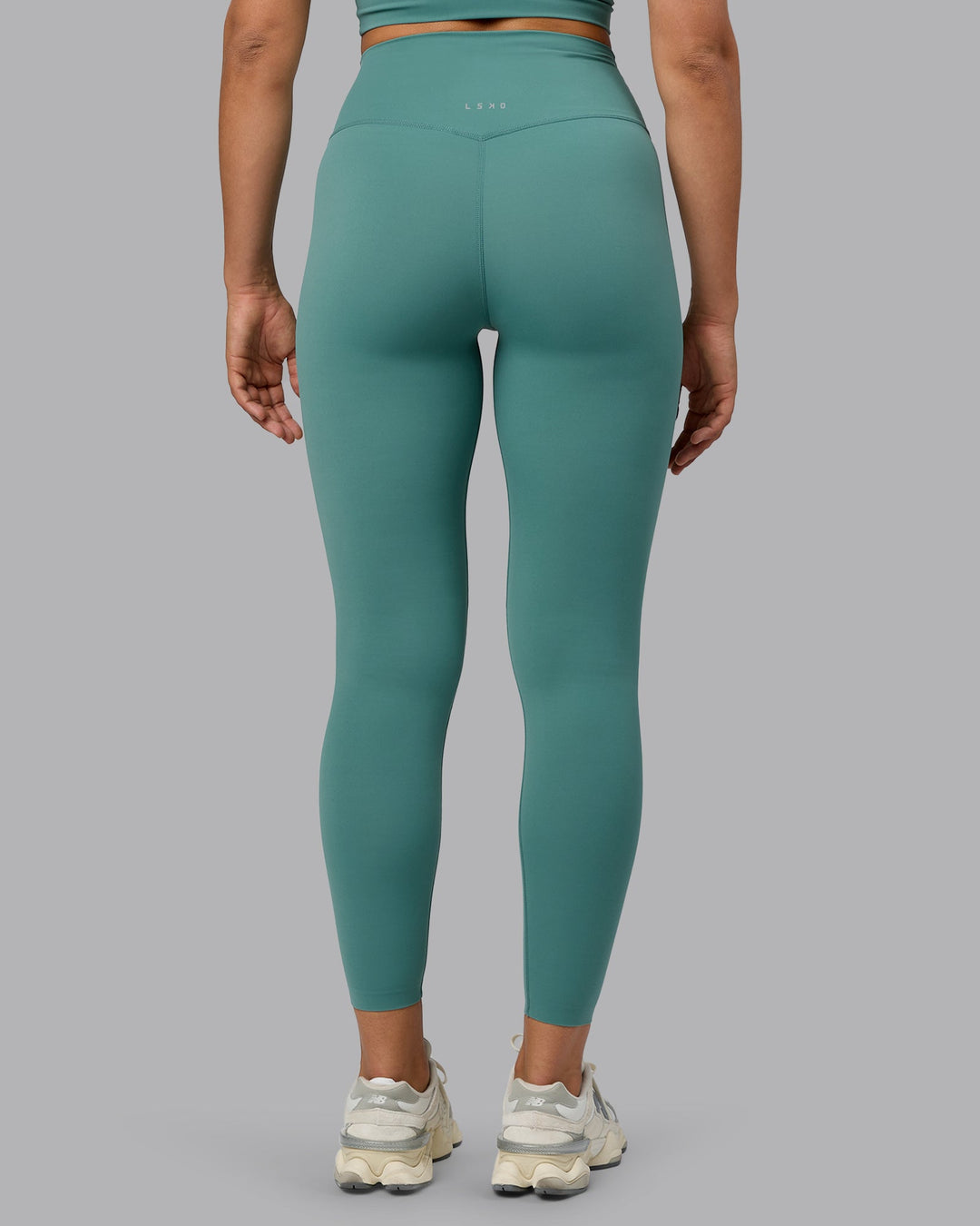 Woman wearing Elixir Ultra High-Rise Full Length Leggings - Sagebrush