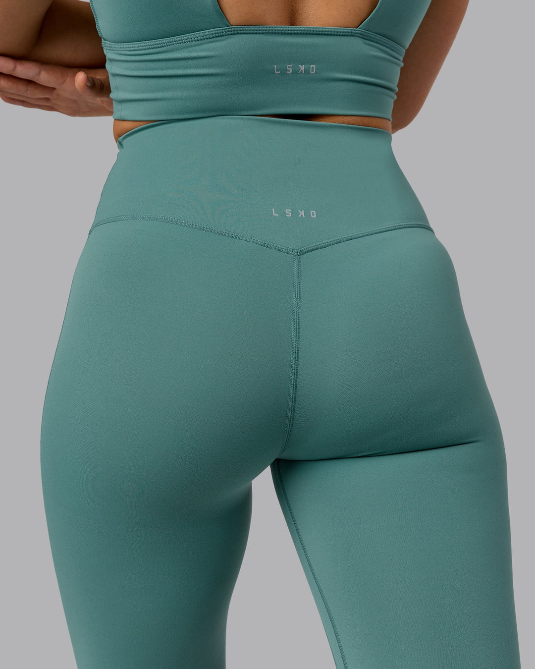 Woman wearing Elixir Ultra High-Rise Full Length Leggings - Sagebrush