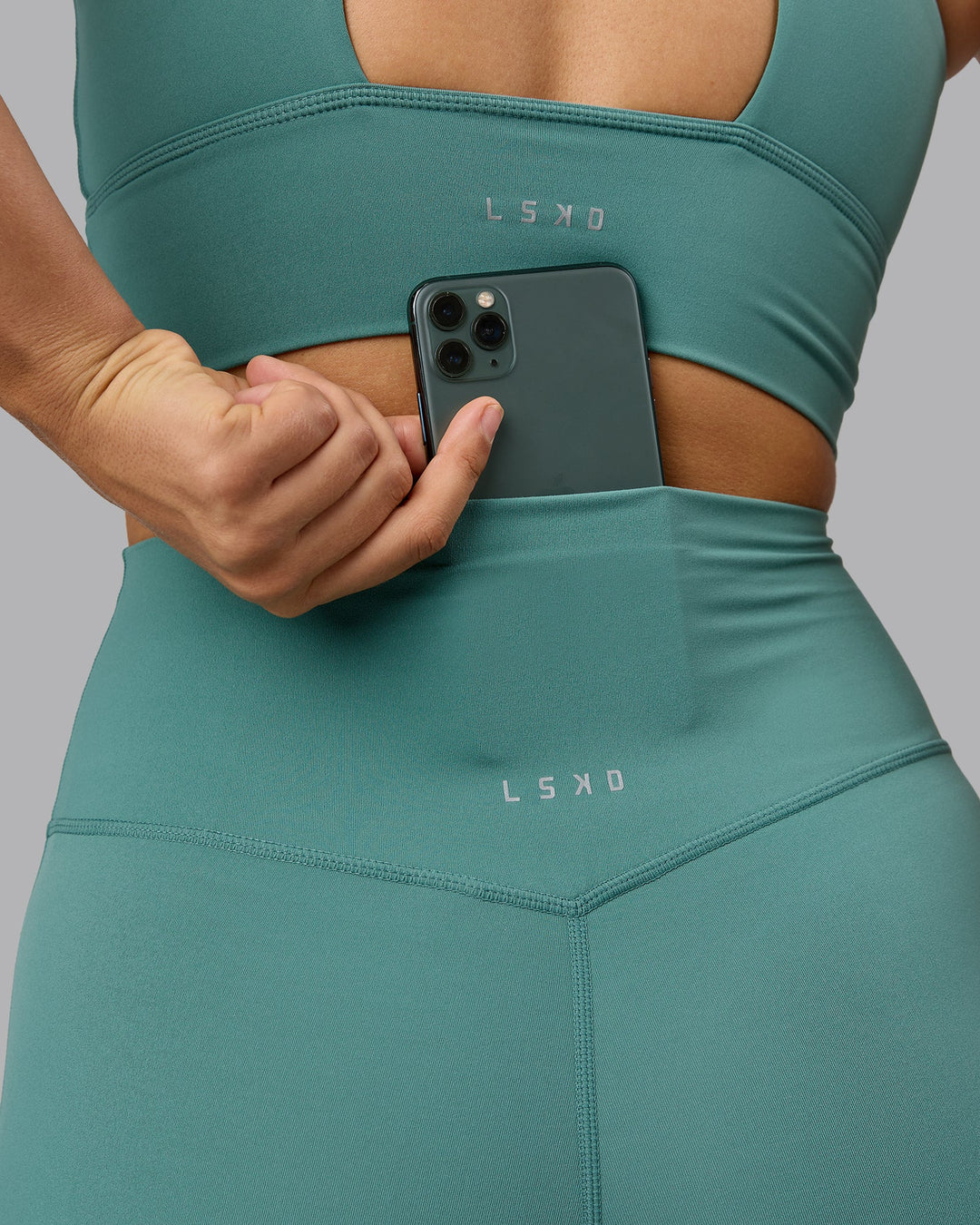 Woman wearing Elixir Ultra High-Rise Full Length Leggings - Sagebrush