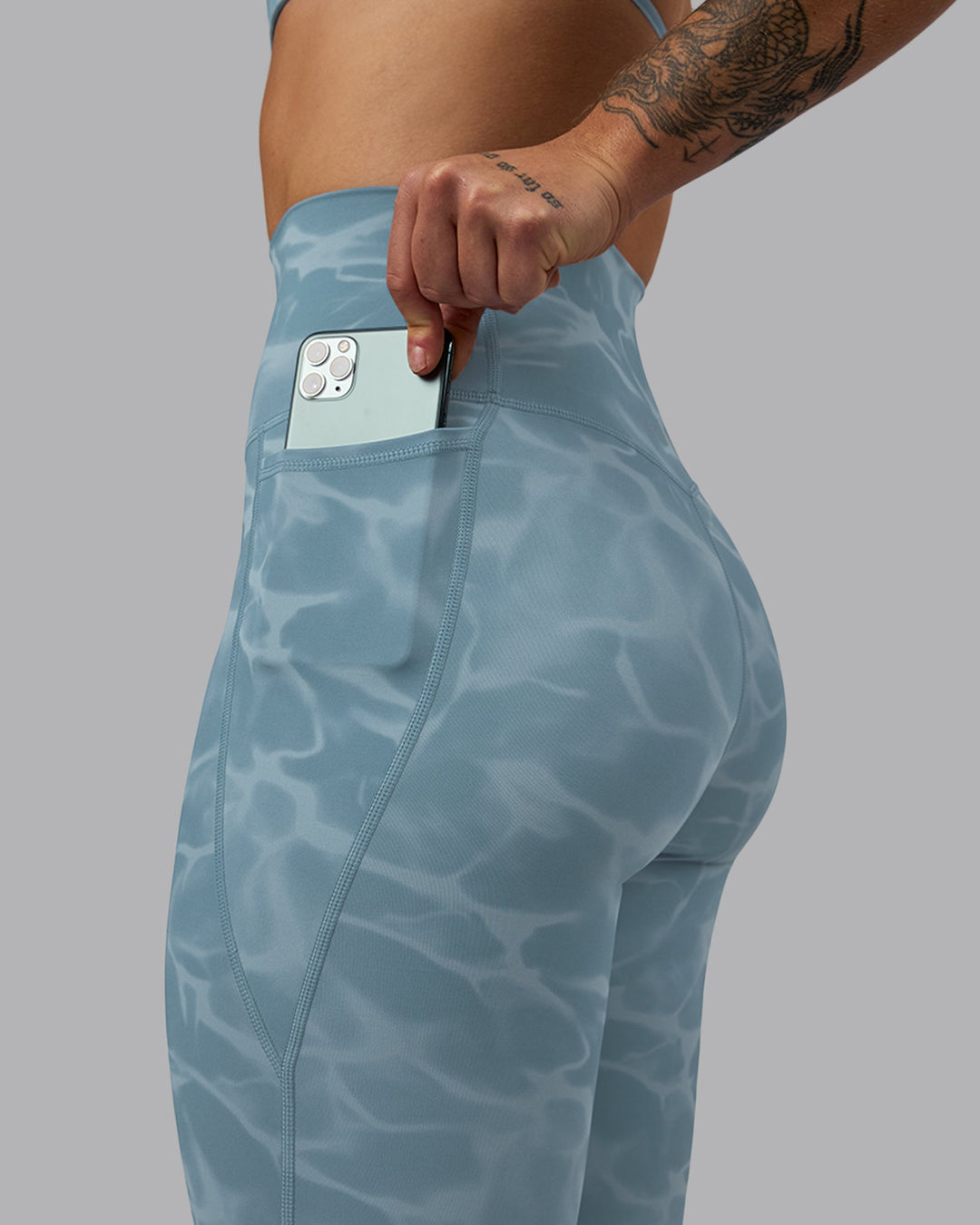 Woman wearing Elixir Ultra High-Rise Full Length Leggings Pockets - Tranquil-Elemental Blue