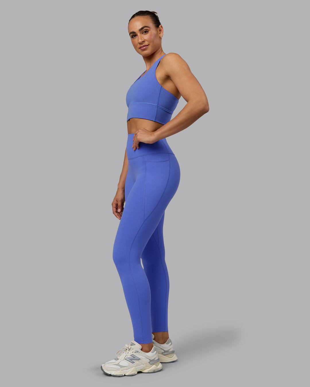 Woman wearing Elixir Ultra High-Rise Full Length Leggings Pockets - Baja Blue