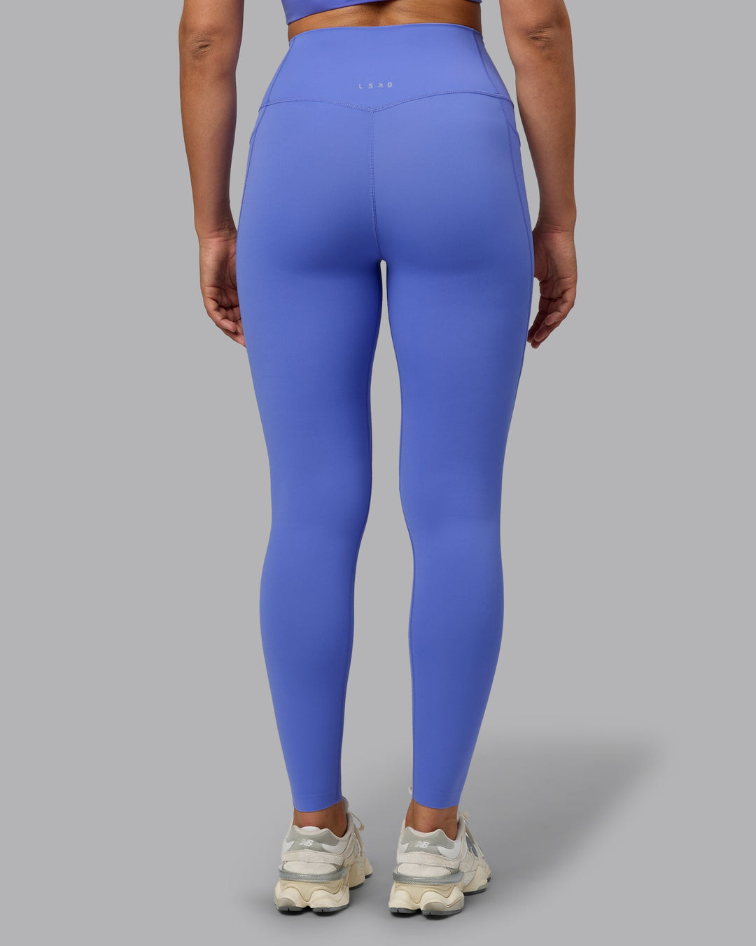 Woman wearing Elixir Ultra High-Rise Full Length Leggings Pockets - Baja Blue