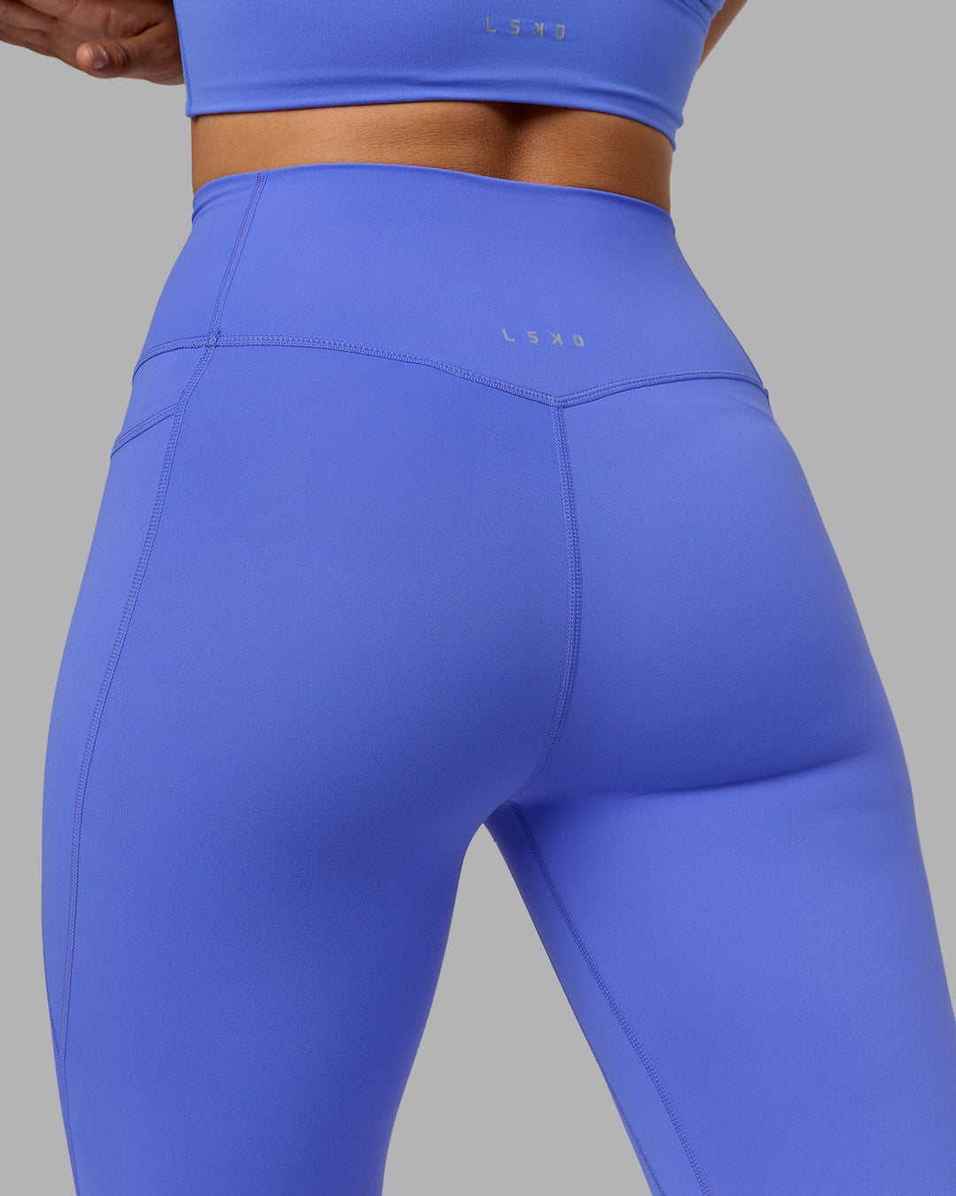 Woman wearing Elixir Ultra High-Rise Full Length Leggings Pockets - Baja Blue
