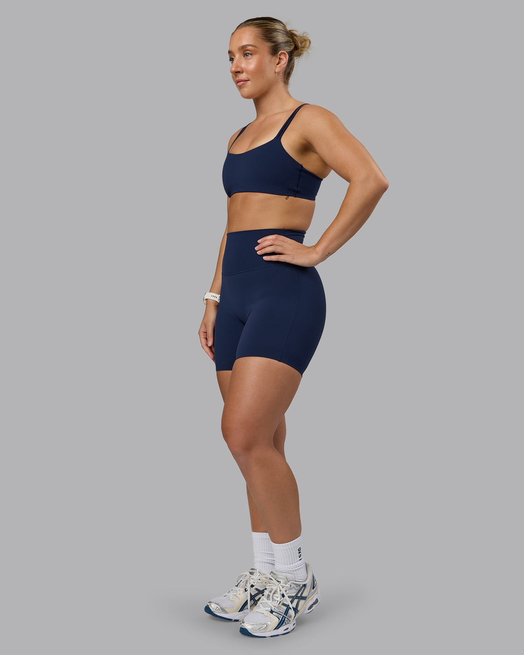 Woman wearing Elixir Ultra High-Rise 6" Short - Future Navy