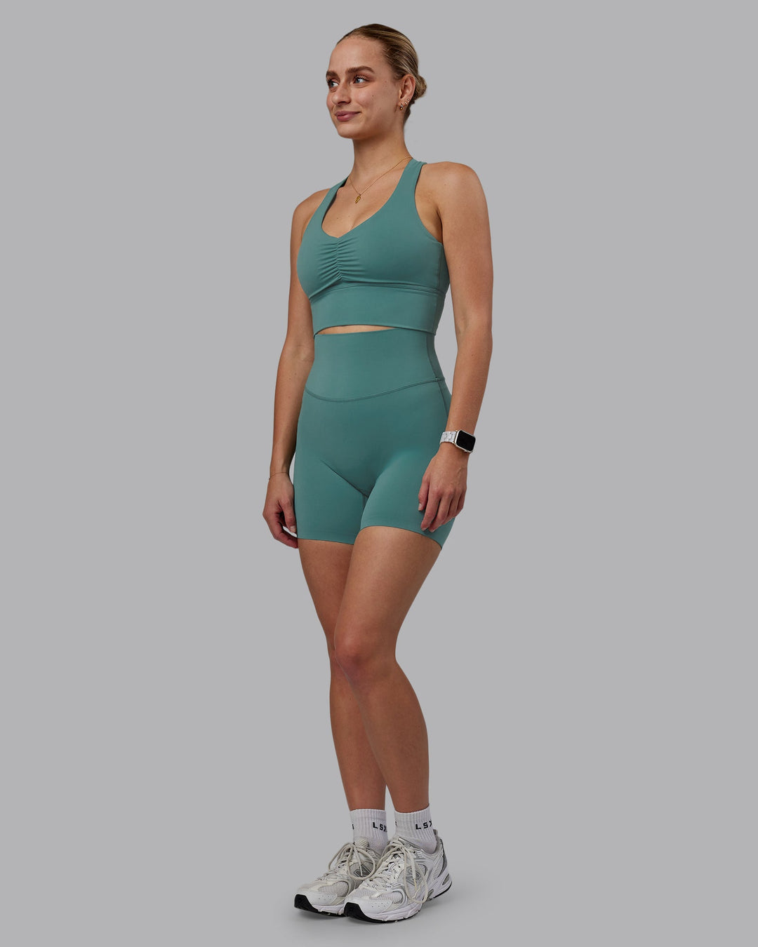 Woman wearing Elixir Ultra High-Rise 6" Short - Sagebrush