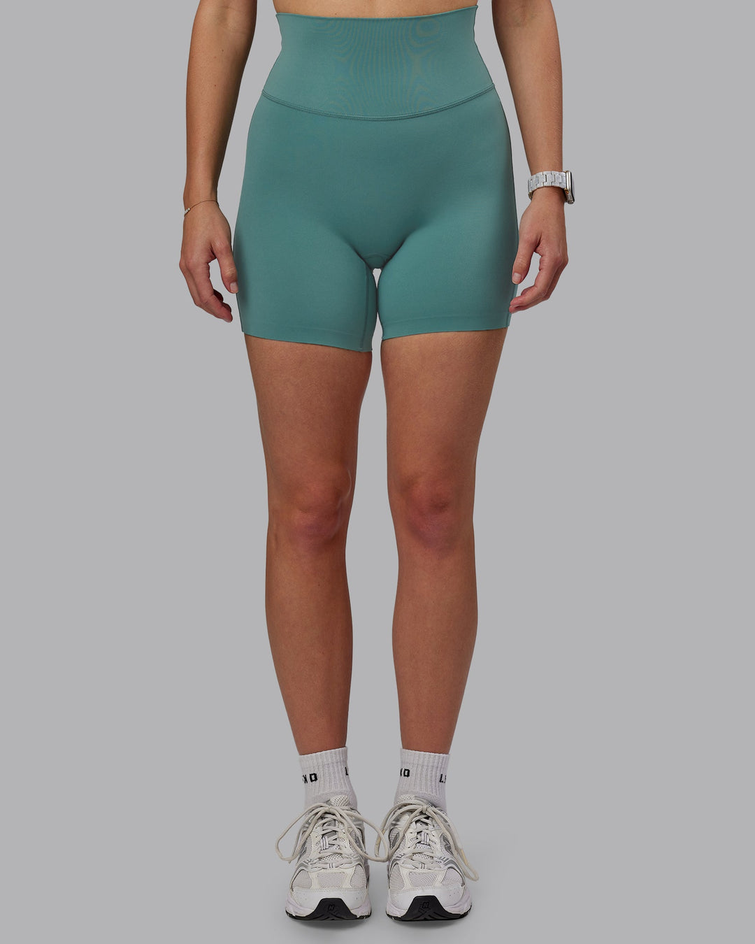 Woman wearing Elixir Ultra High-Rise 6" Short - Sagebrush