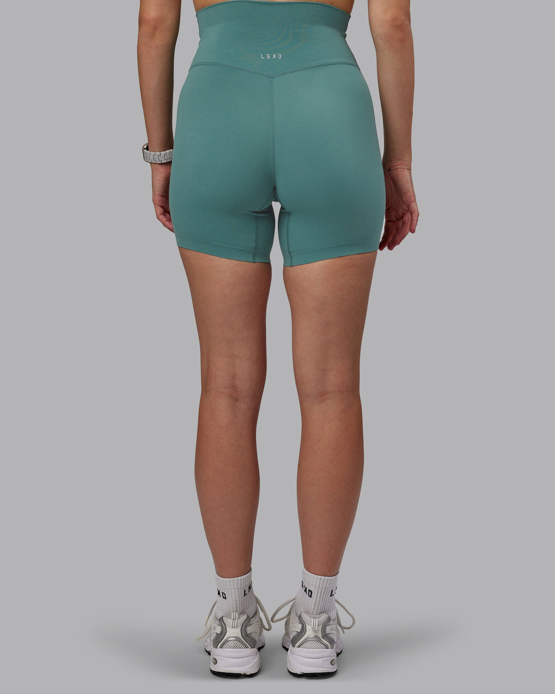 Woman wearing Elixir Ultra High-Rise 6" Short - Sagebrush