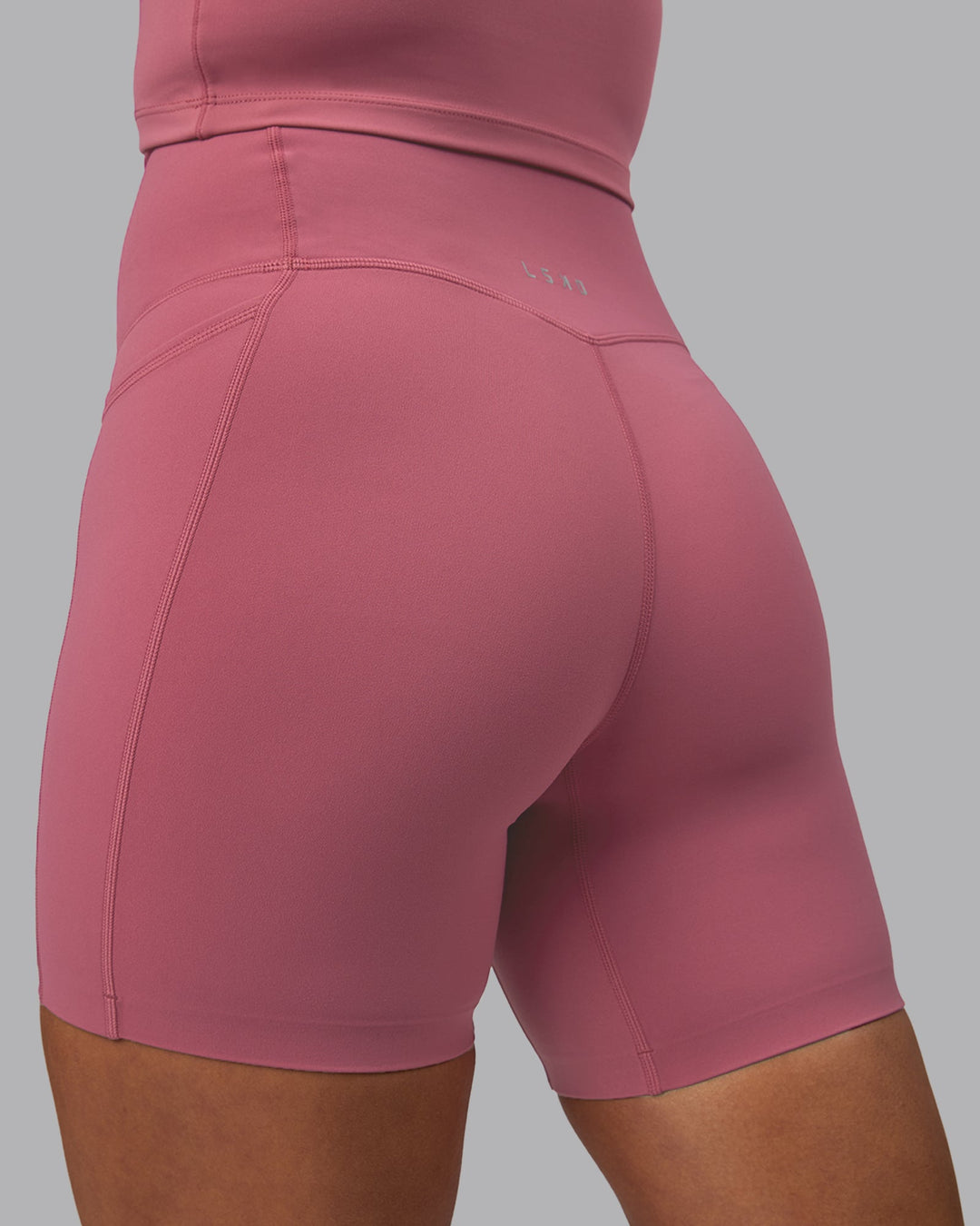 Woman wearing Elixir Ultra High-Rise 6" Short Pockets - Mauve Haze