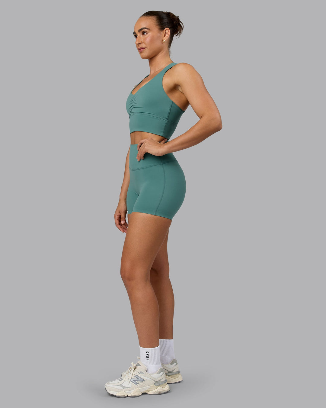 Woman wearing Elixir Ultra High-Rise 4" Short - Sagebrush