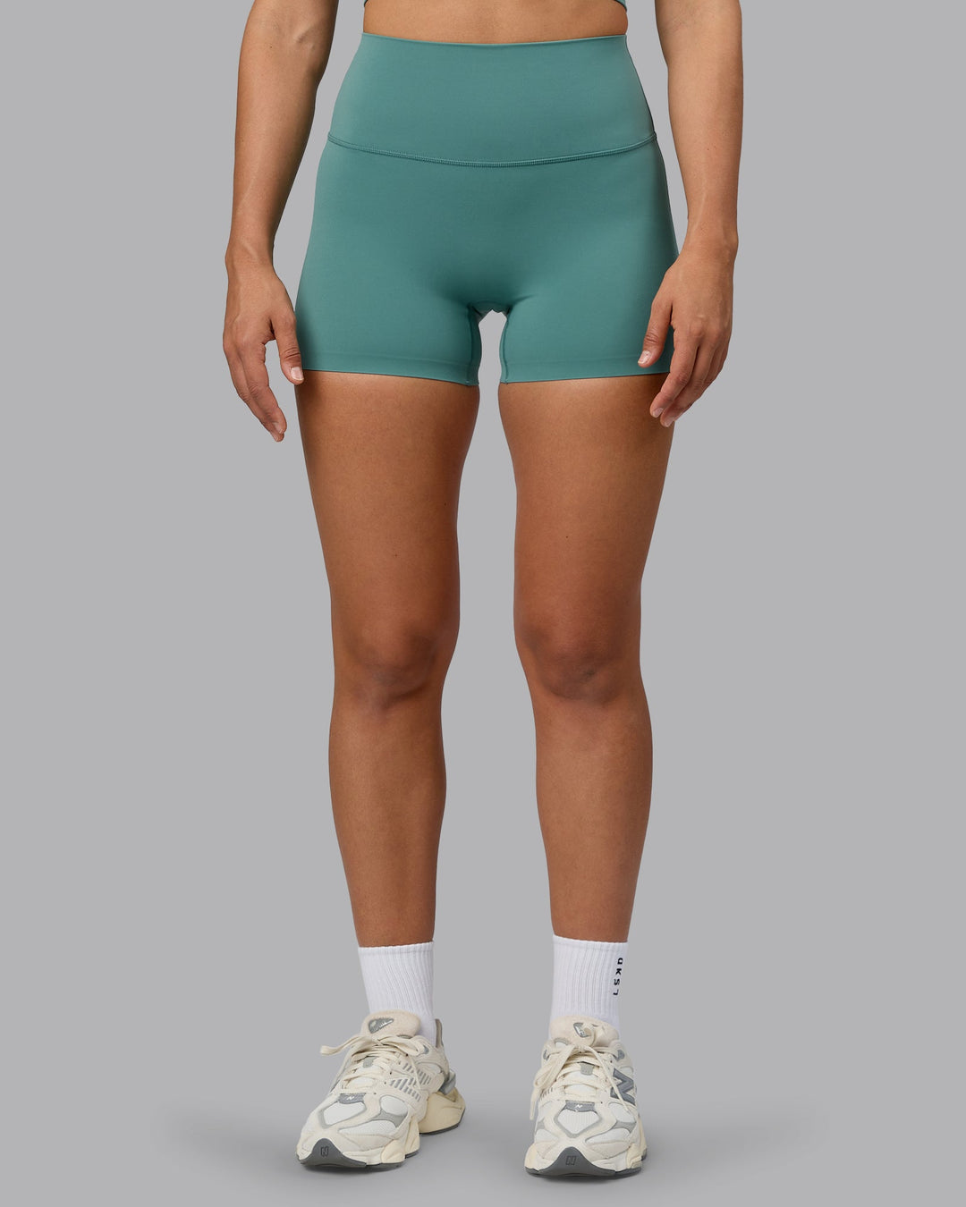 Woman wearing Elixir Ultra High-Rise 4" Short - Sagebrush