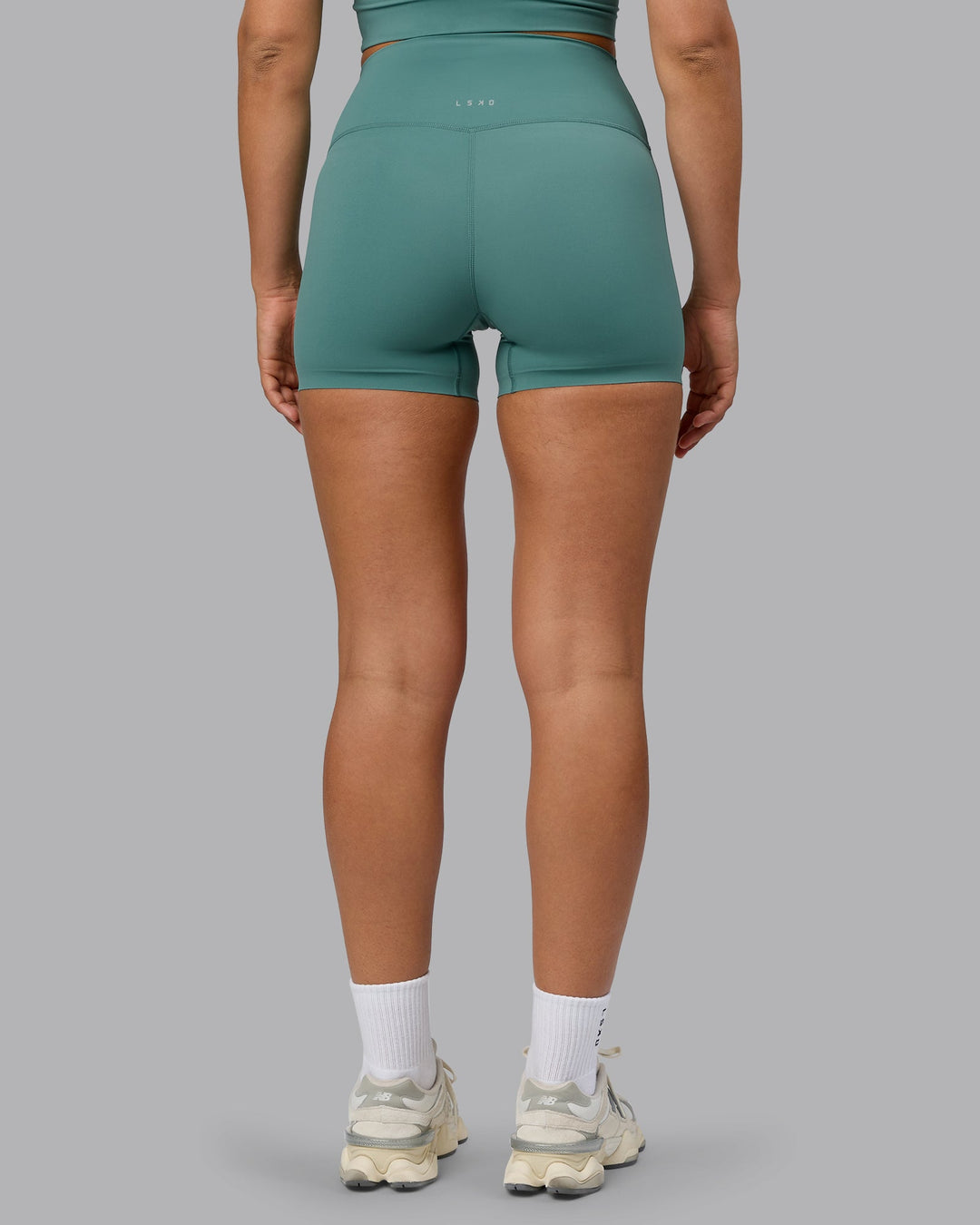 Woman wearing Elixir Ultra High-Rise 4" Short - Sagebrush