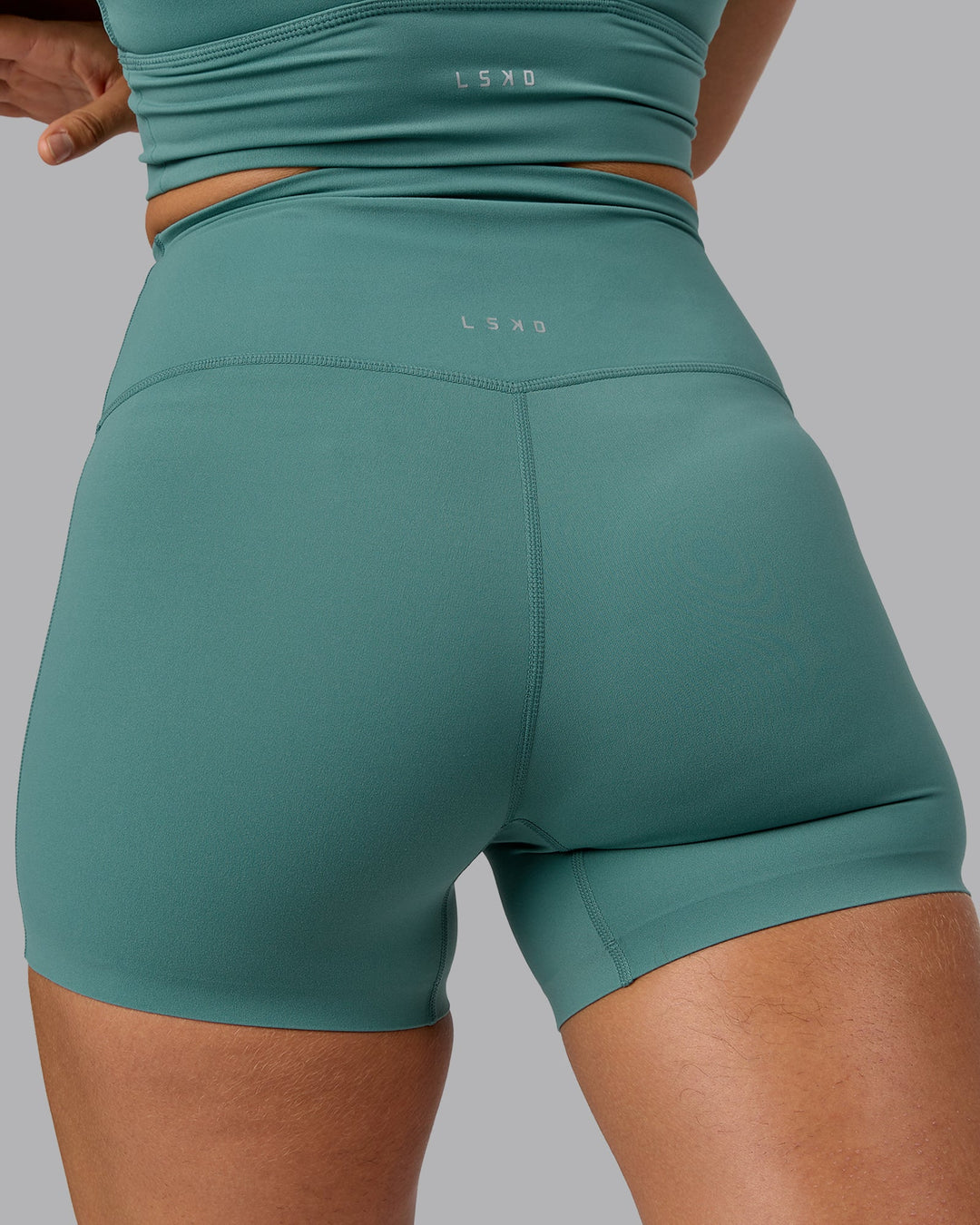 Woman wearing Elixir Ultra High-Rise 4" Short - Sagebrush