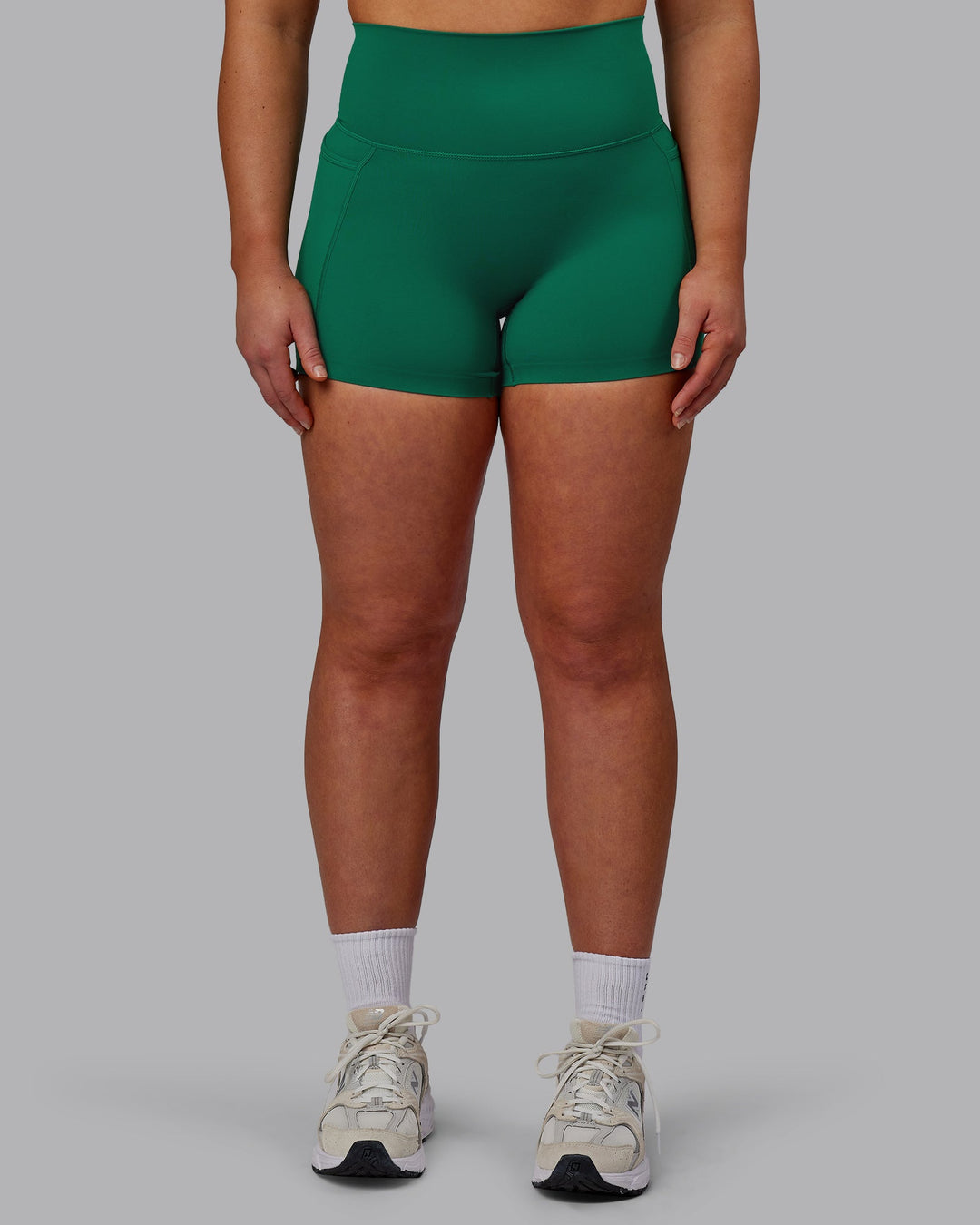 Woman wearing Elixir Ultra High-Rise 4" Short Pockets - Malachite
