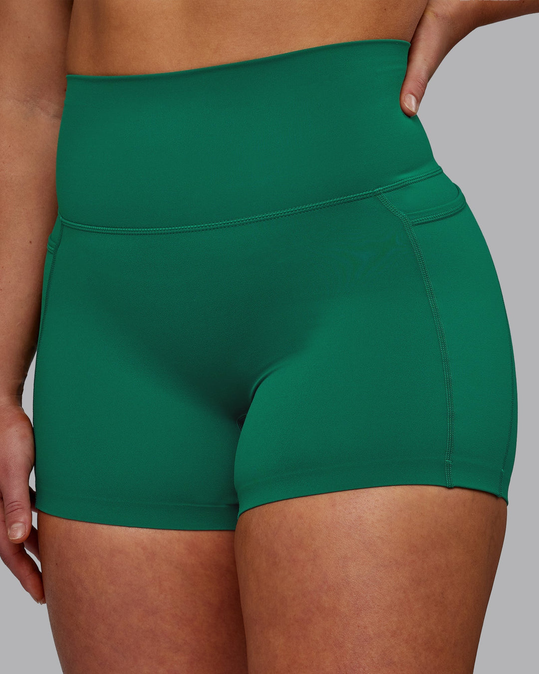 Woman wearing Elixir Ultra High-Rise 4" Short Pockets - Malachite