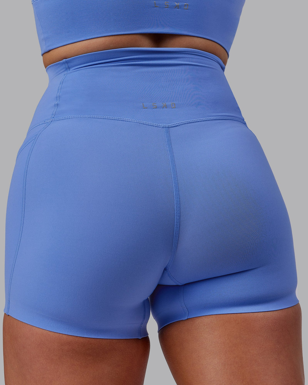 Woman wearing Elixir Ultra High-Rise 4" Short Pockets - Ultramarine