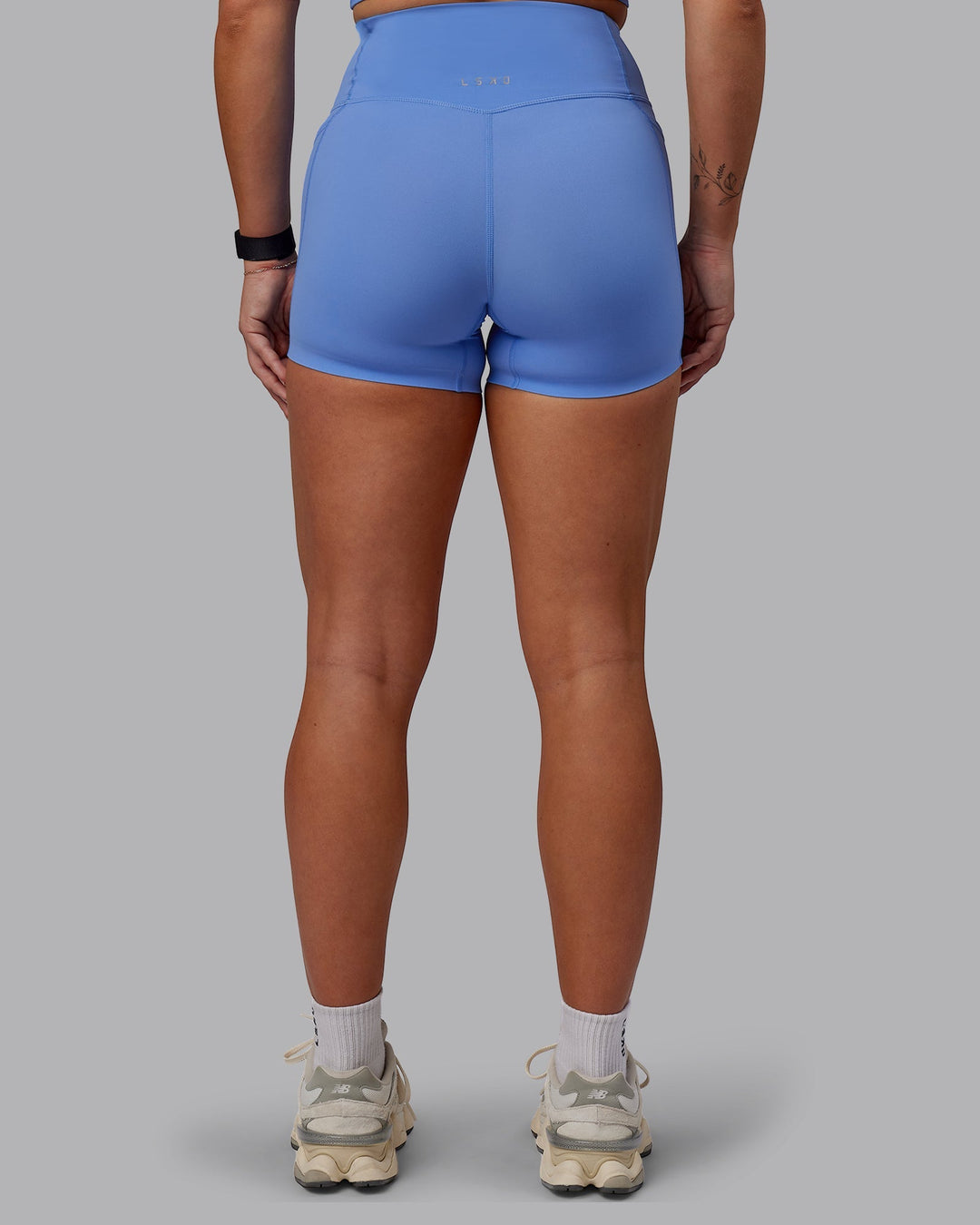 Woman wearing Elixir Ultra High-Rise 4" Short Pockets - Ultramarine