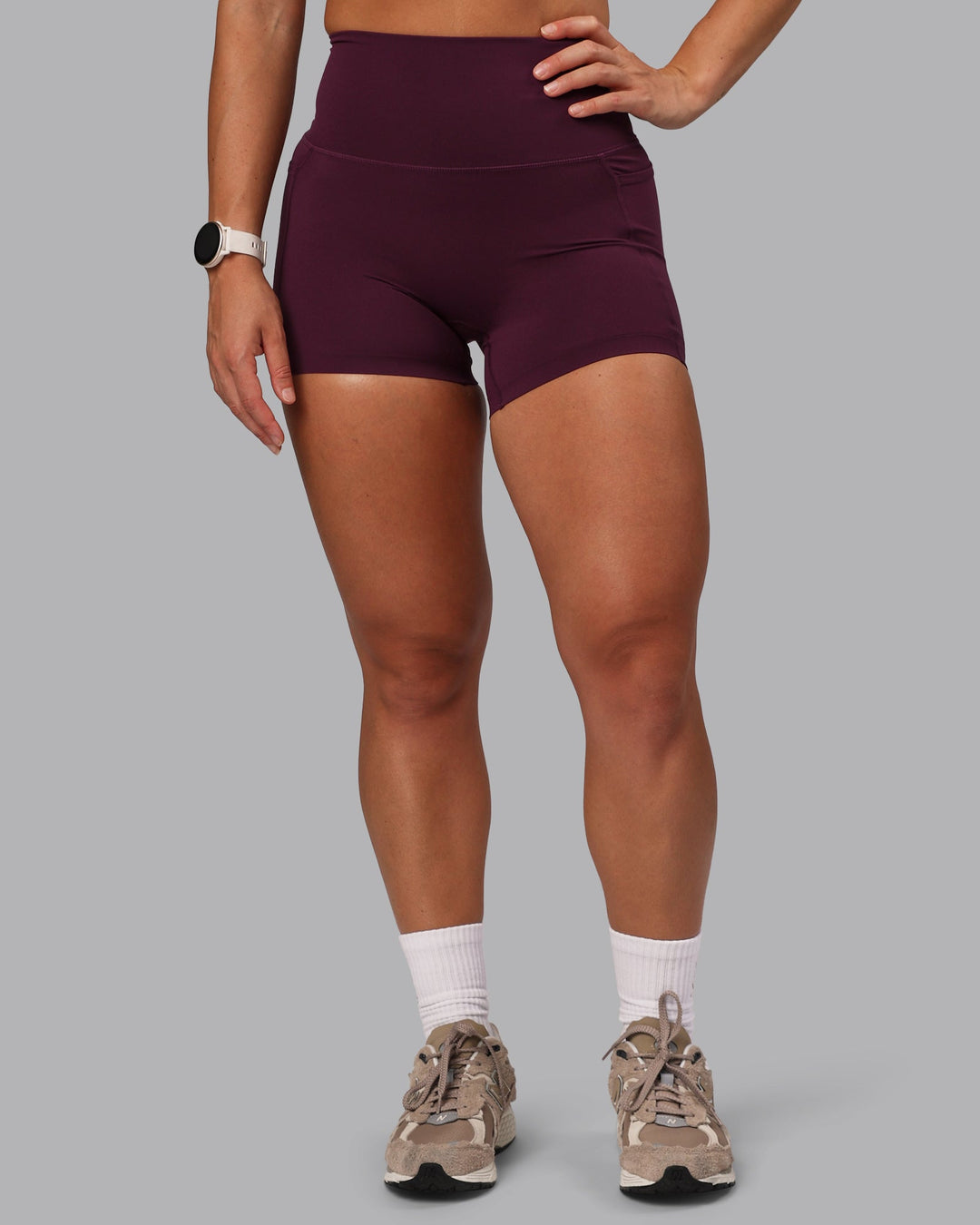 Woman wearing Elixir Ultra High-Rise 4" Short Pockets - Cherry Lacquer