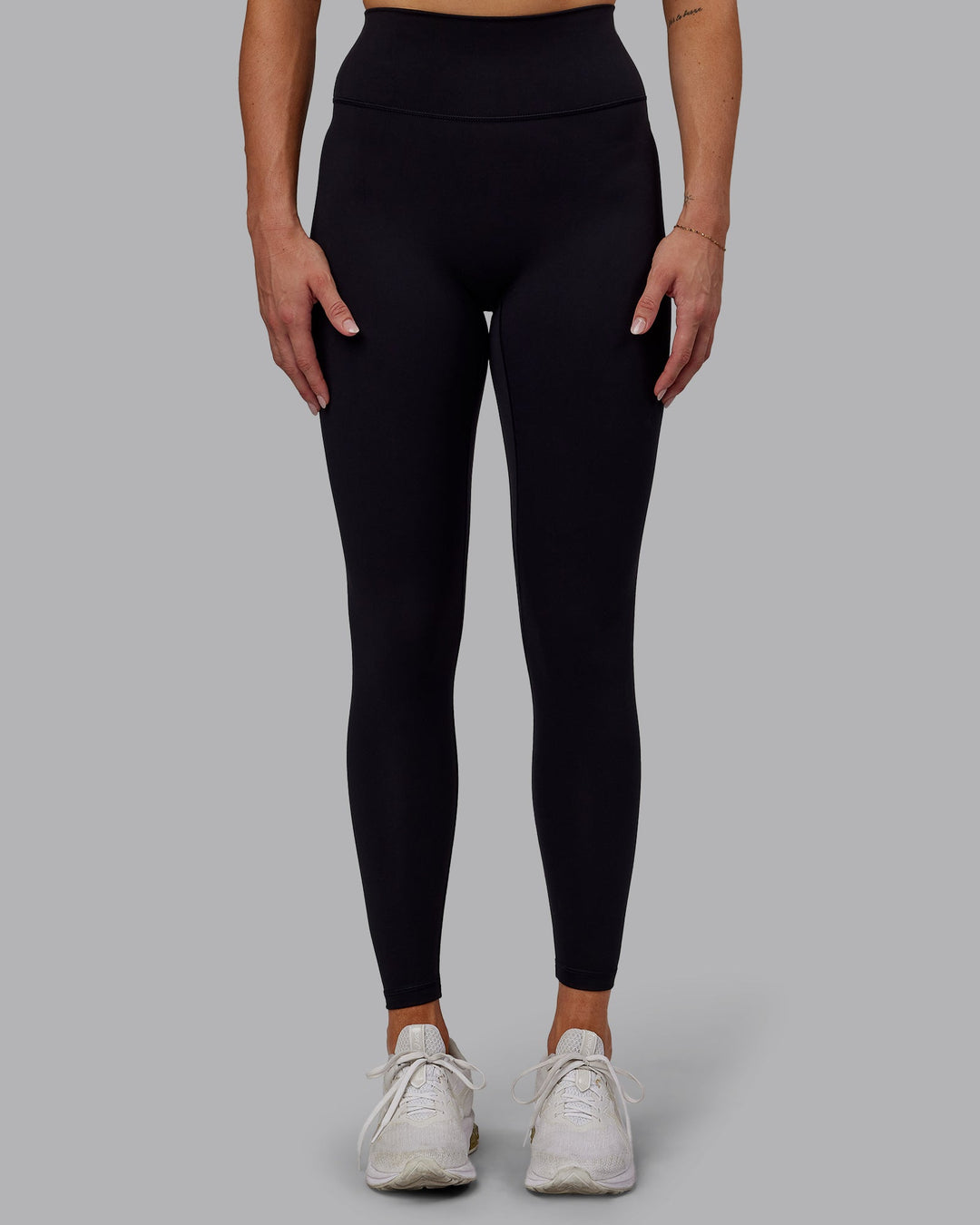 Woman wearing Fusion Ultra High-Rise Full Length Legging - Black | Model:Hannah | Size:S