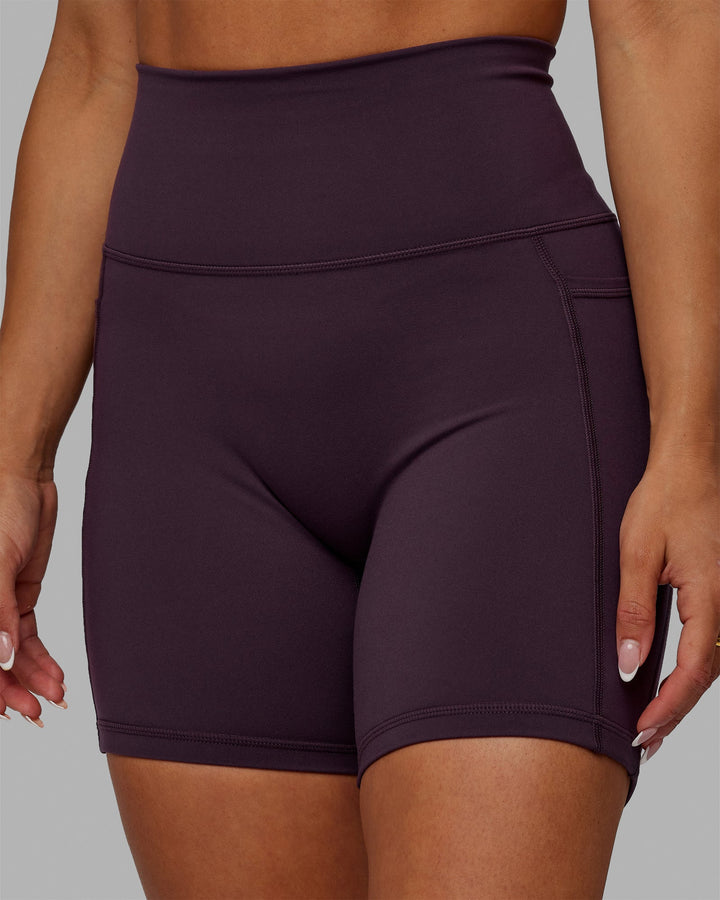 Woman wearing Fusion Mid-Length Shorts - Midnight Plum