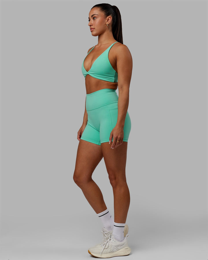 Woman wearing Fusion X-Length Shorts - Aquatic Awe