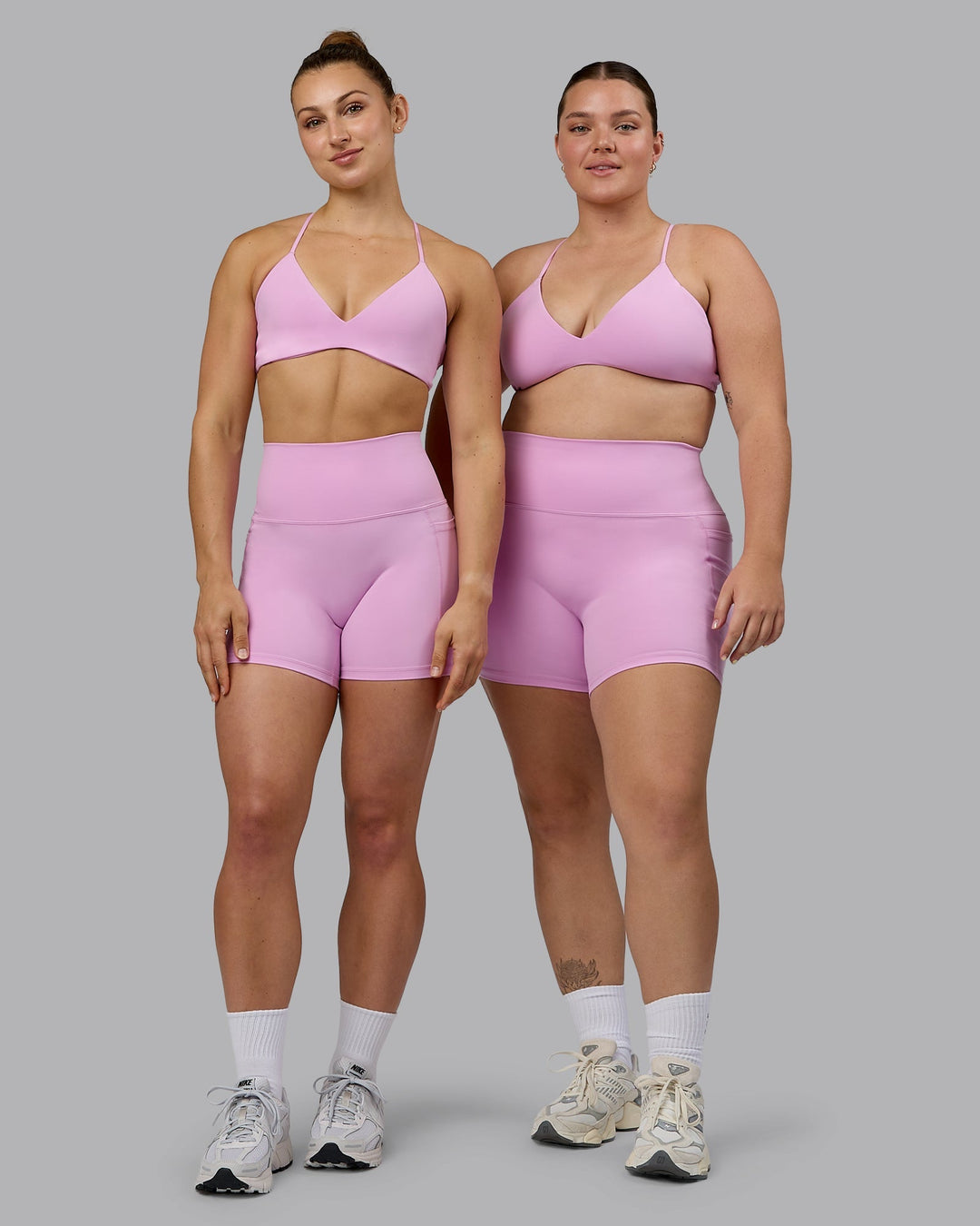 Woman wearing Fusion Ultra High-Rise 4" Short Pockets - Pastel Orchid | Model:Both | Size:Duo
