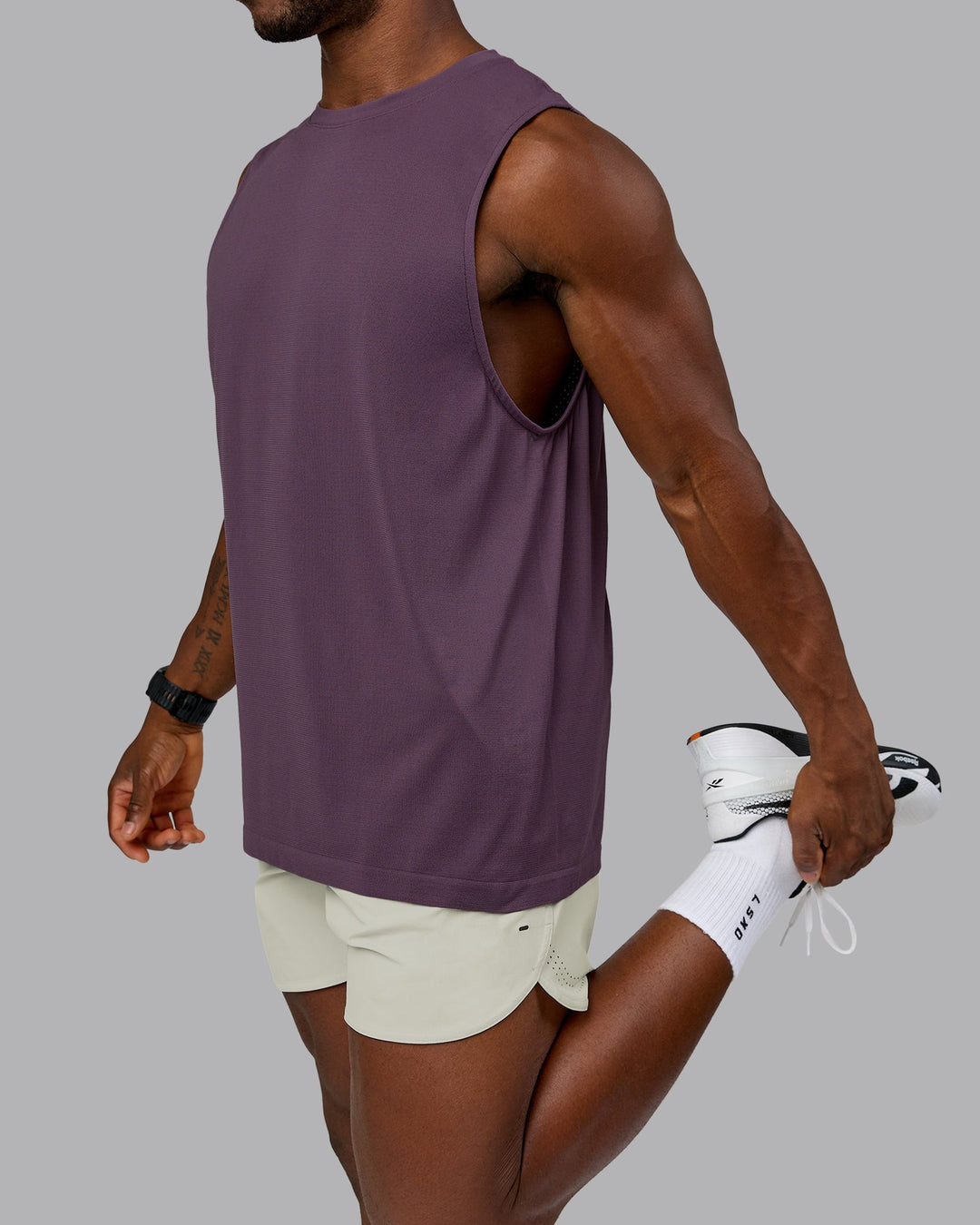 Man wearing Lift 6" Performance Short - Bone | Model:Sam | Size:L
