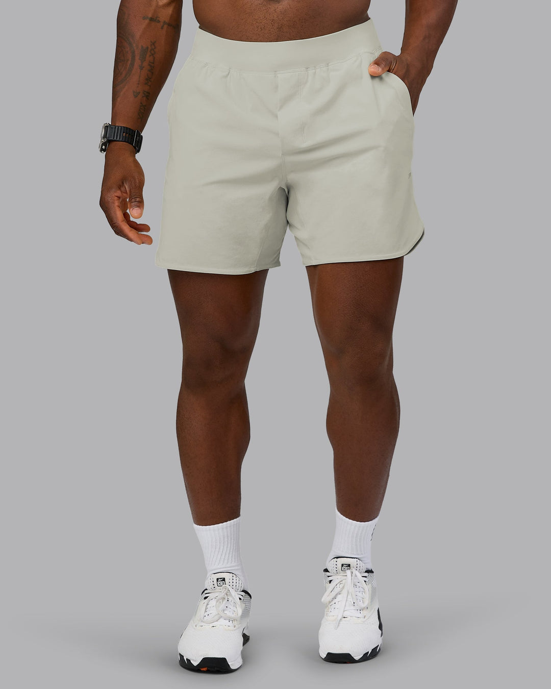 Man wearing Lift 6" Performance Short - Bone | Model:Sam | Size:L