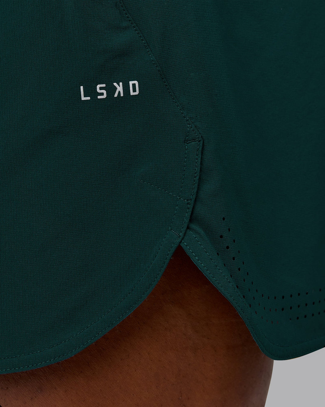 Man wearing Lift 6" Performance Short - Dark Moss | Model:Sam | Size:L