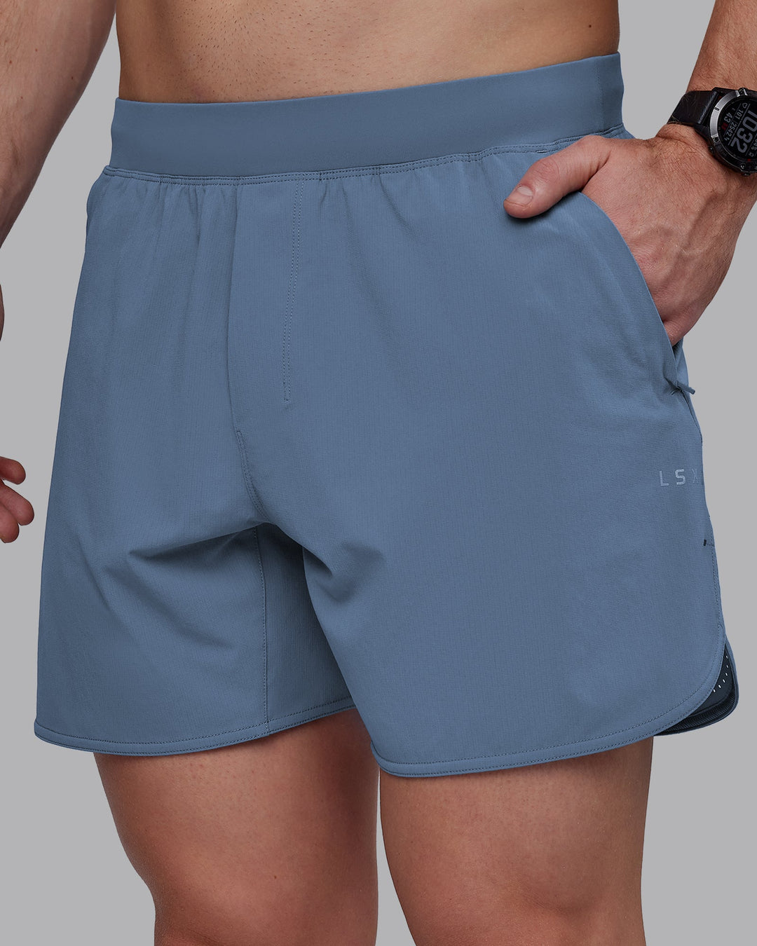 Man wearing Lift 6" Performance Shorts - Elemental Blue