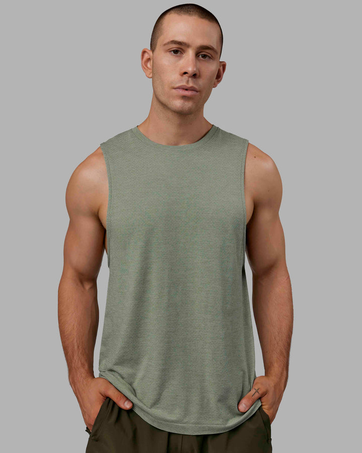 Man wearing AeroFLX+ Seamless Muscle Tank - Iceberg Green Marl
