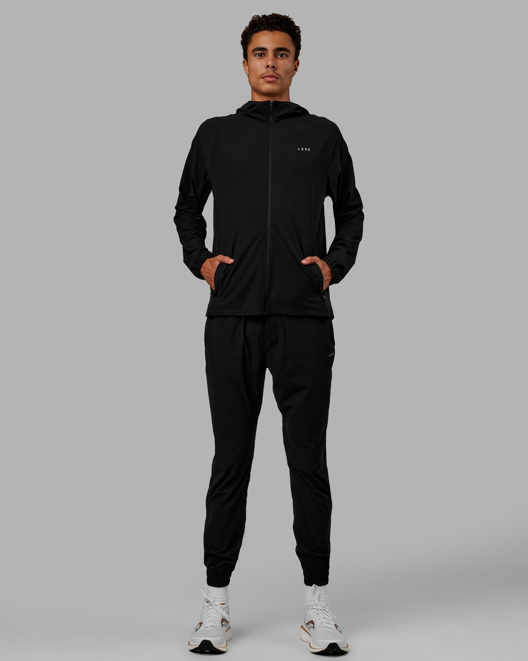 Man wearing Train-Lite FLXMAX Jacket - Black