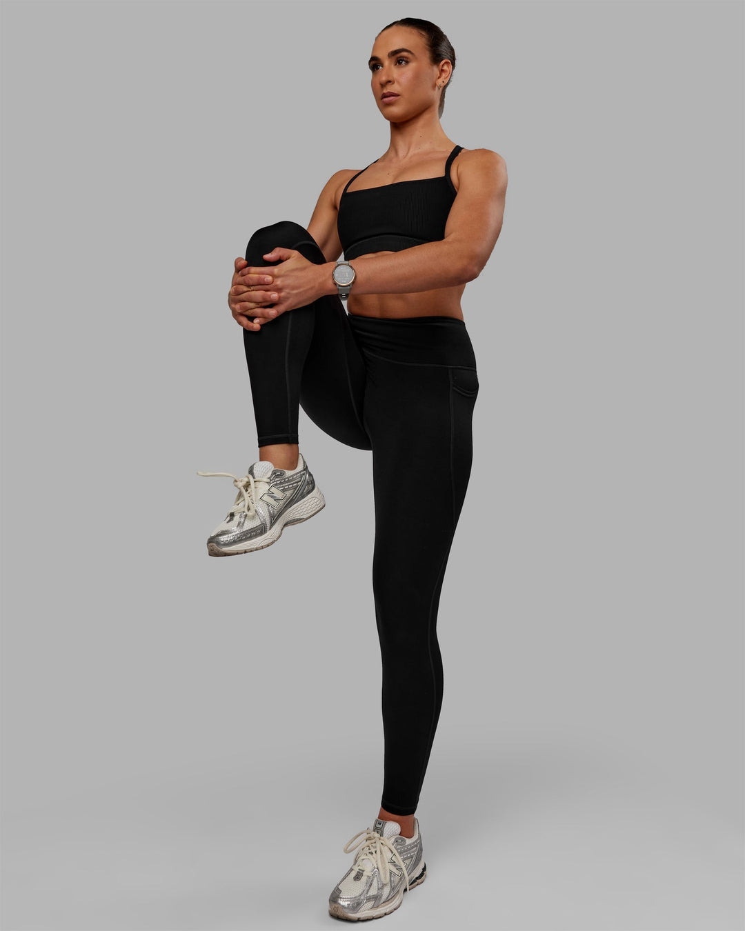 Woman wearing Motion Ultra High-Rise Thermal Full Length Legging - Black
