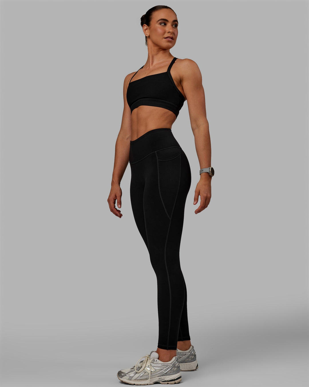 Woman wearing Motion Ultra High-Rise Thermal Full Length Legging - Black