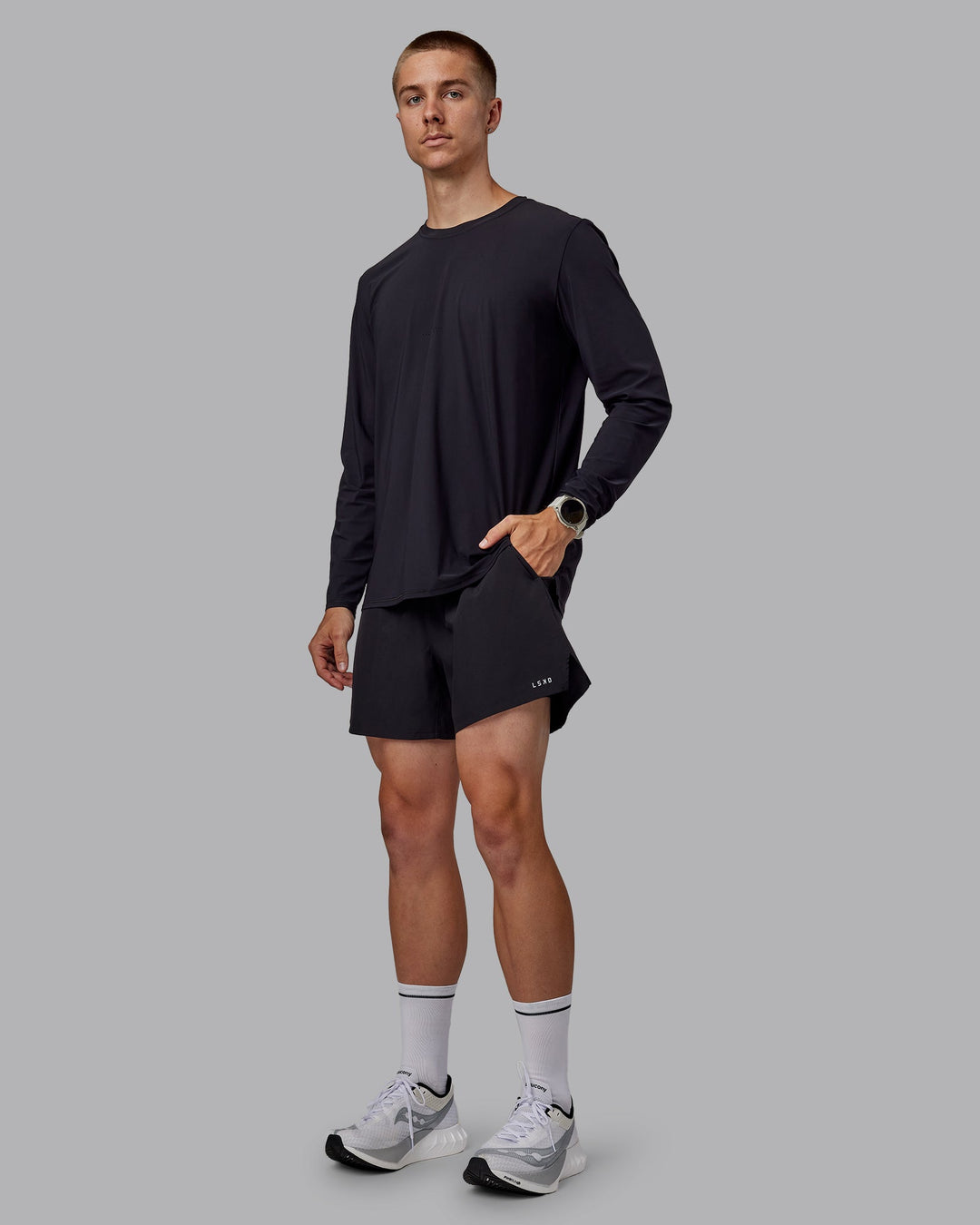 Man wearing Pace 5" Lined Performance Shorts - Black-Retro Blue