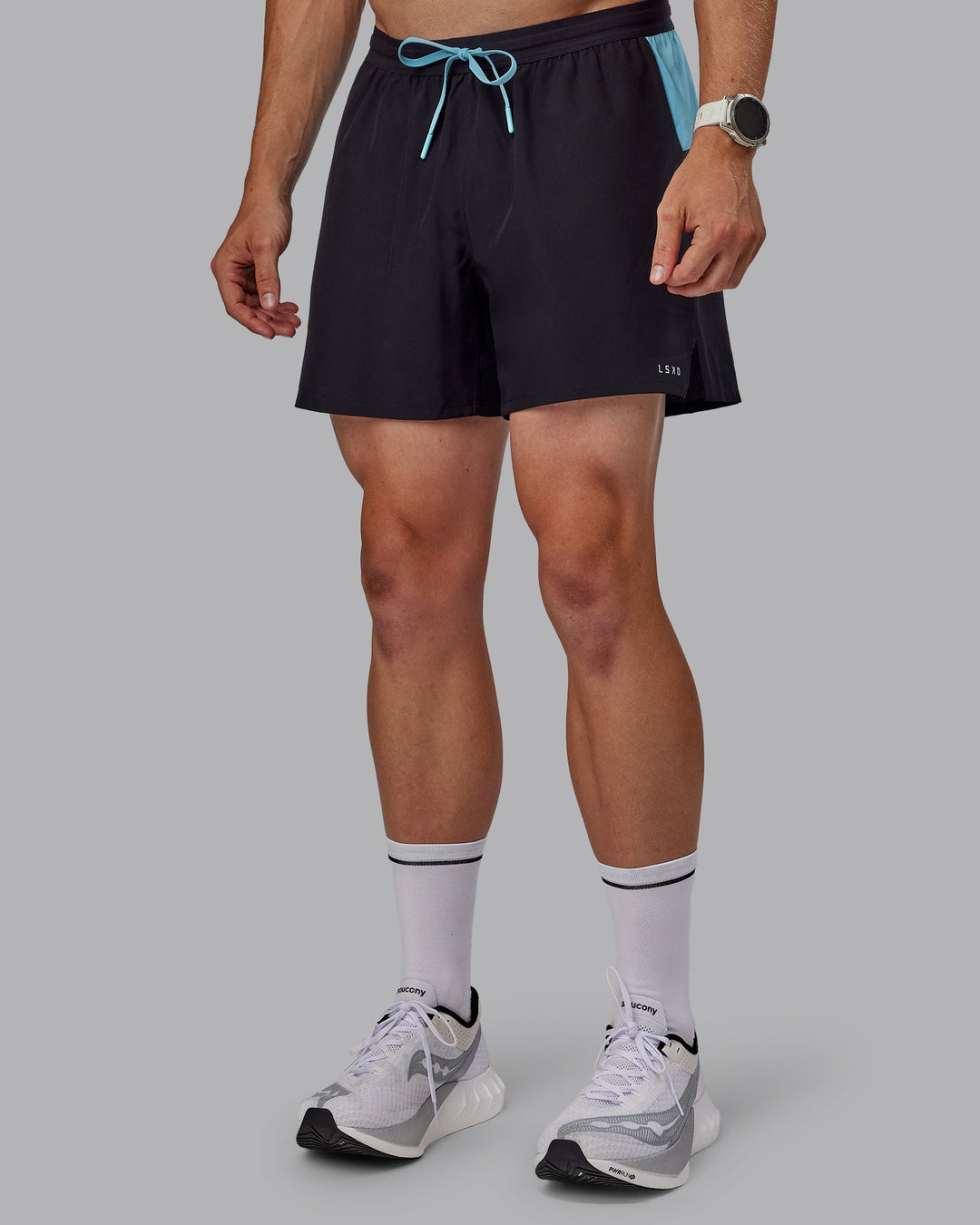 Man wearing Pace 5" Lined Performance Shorts - Black-Retro Blue