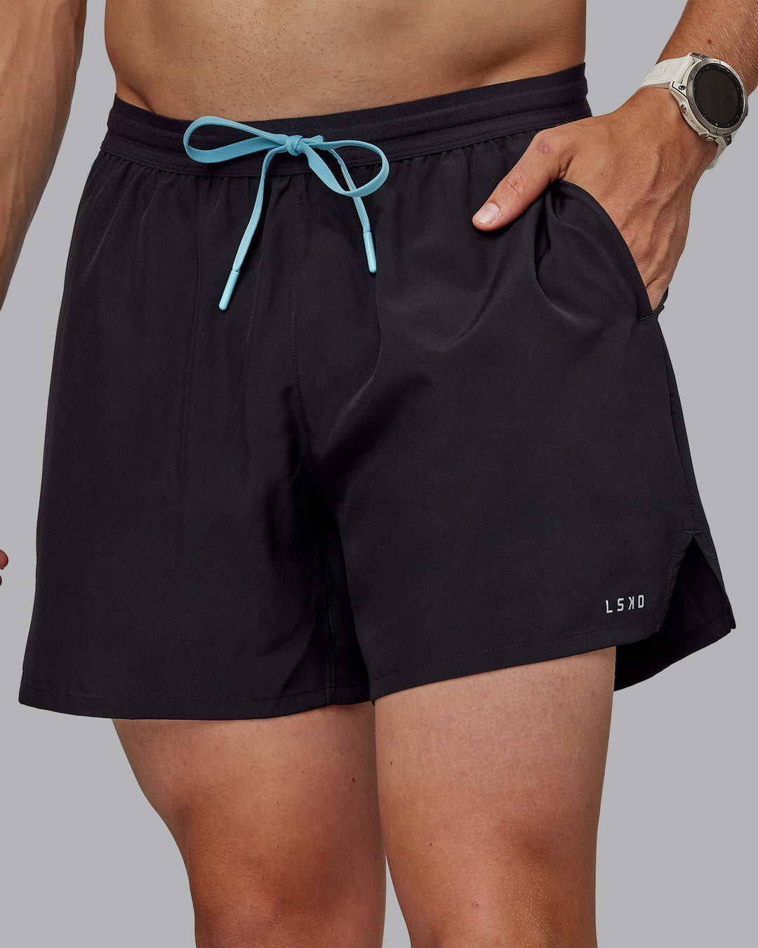 Man wearing Pace 5" Lined Performance Shorts - Black-Retro Blue
