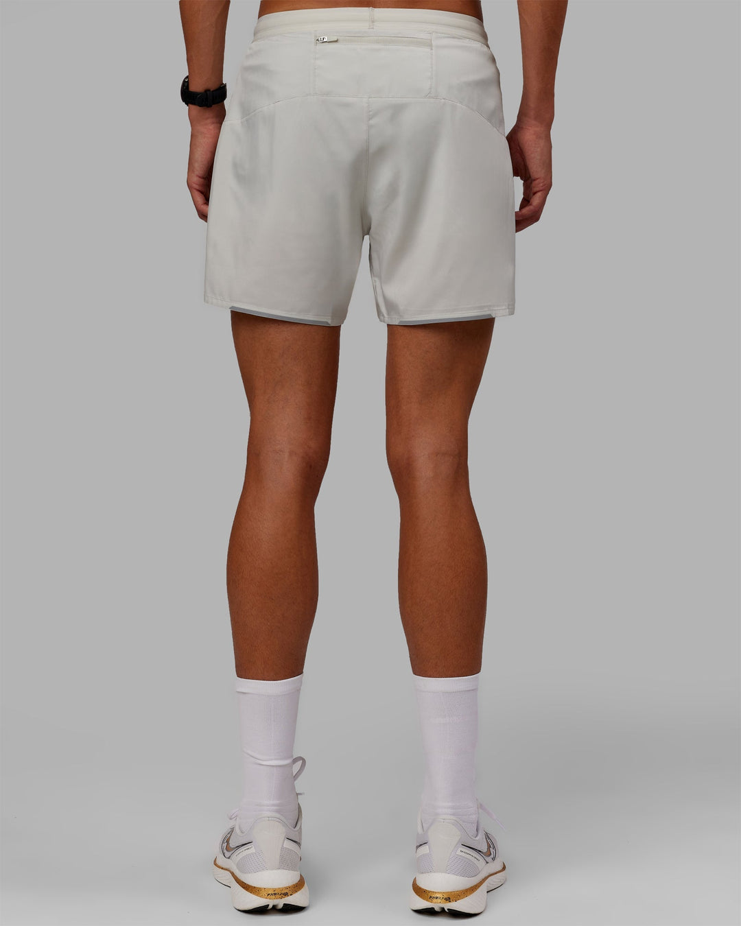 Man wearing Pace 5" Lined Performance Shorts - Digital Mist-Reflective