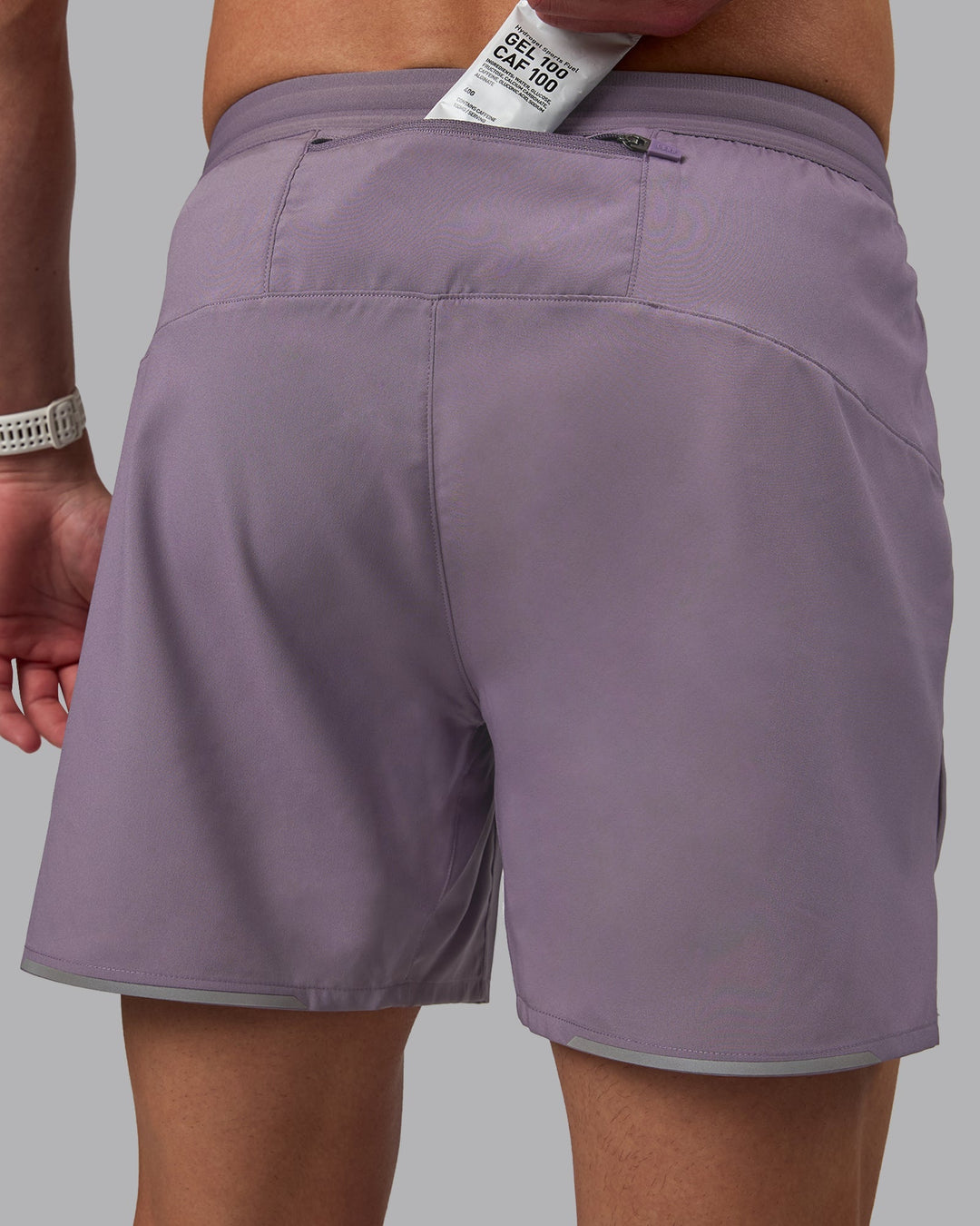 Man wearing Pace 5" Lined Performance Shorts - Purple Sage