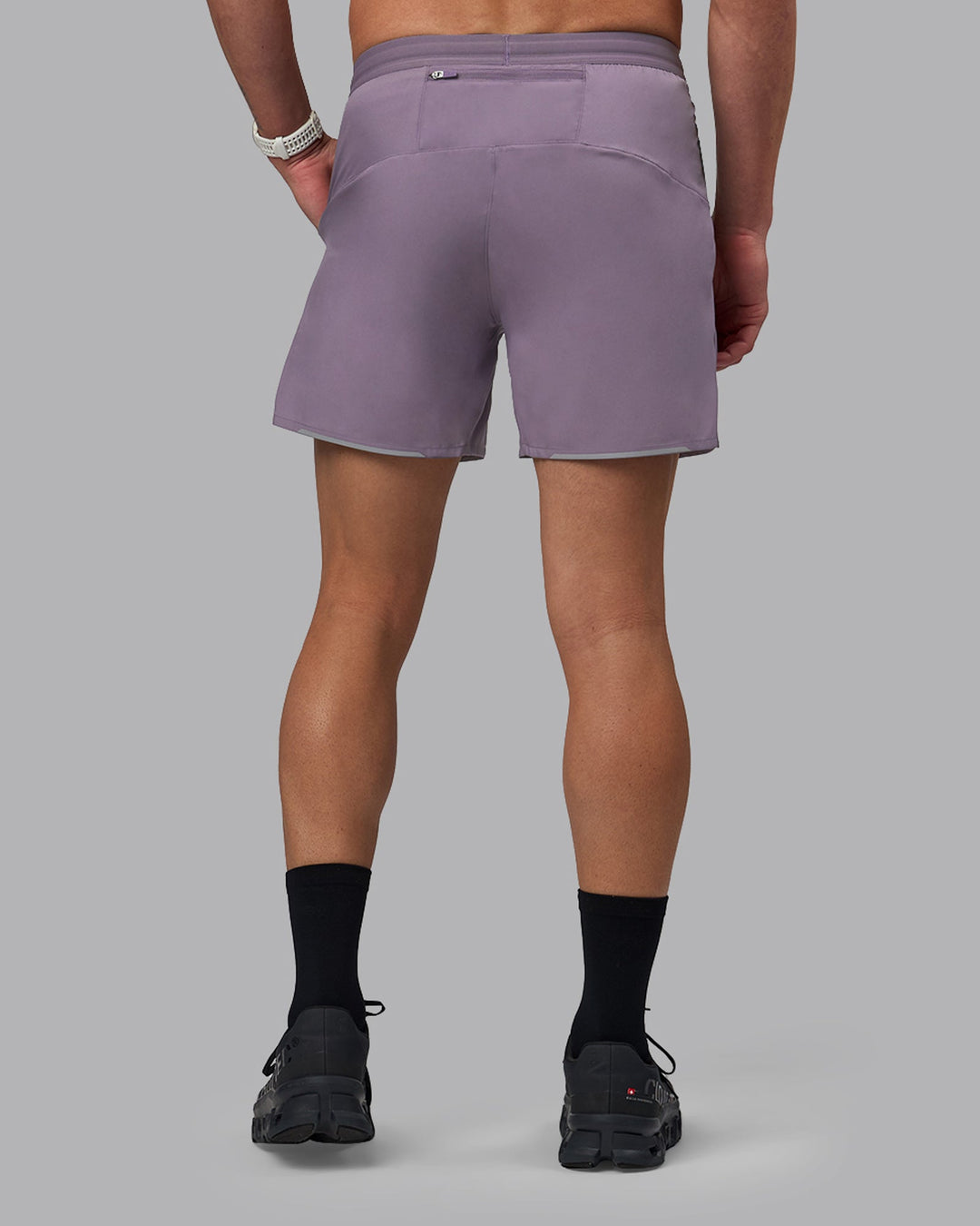 Man wearing Pace 5" Lined Performance Shorts - Purple Sage
