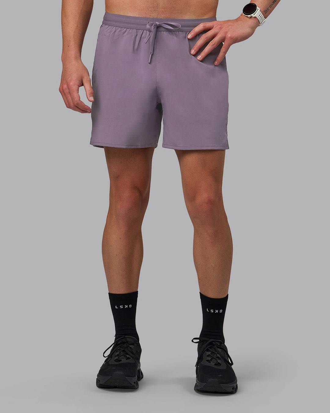 Man wearing Pace 5" Lined Performance Shorts - Purple Sage