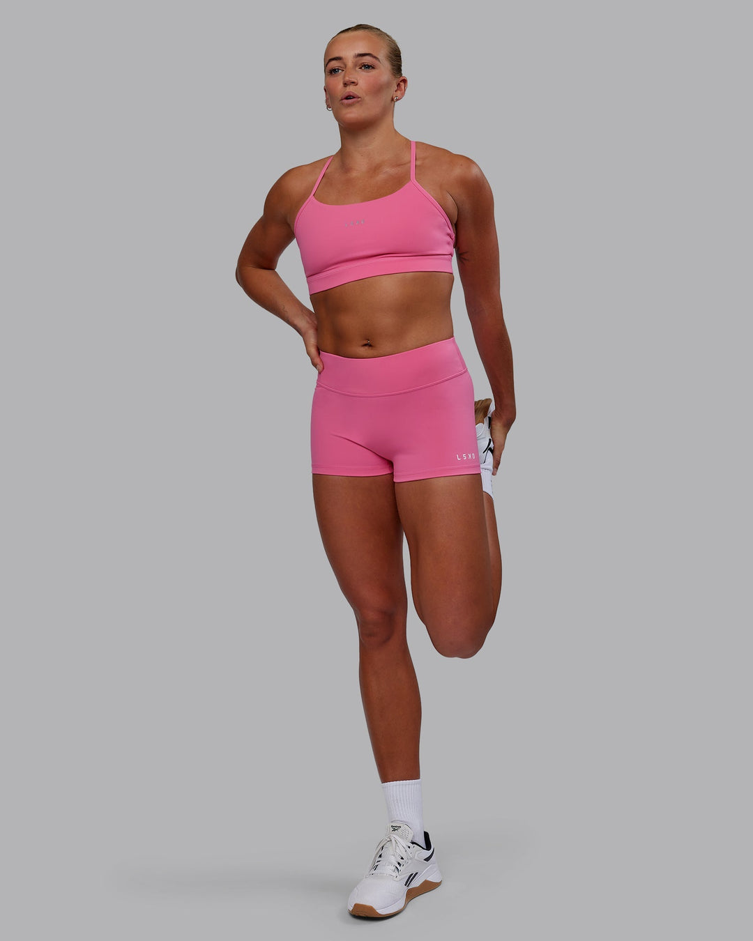 Woman wearing RXD Low-Rise 2" Short - Carmine Rose