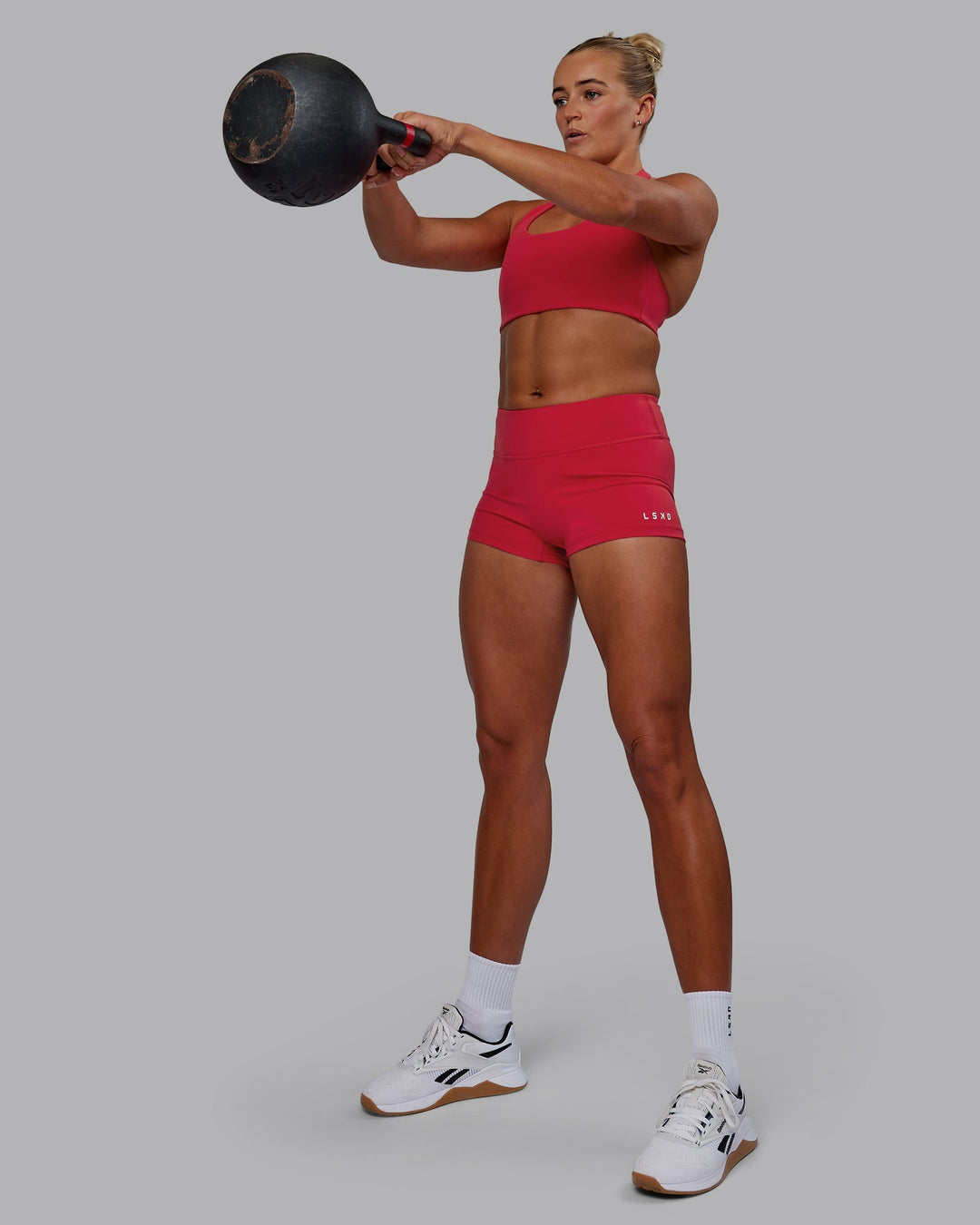Woman wearing RXD Low-Rise 2" Short - Scarlet