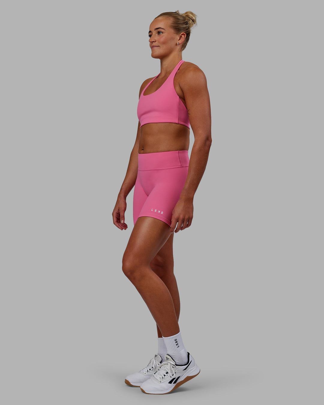Woman wearing RXD Low-Rise 6" Short - Carmine Rose