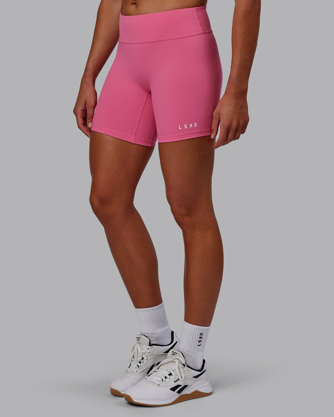 Woman wearing RXD Low-Rise 6" Short - Carmine Rose