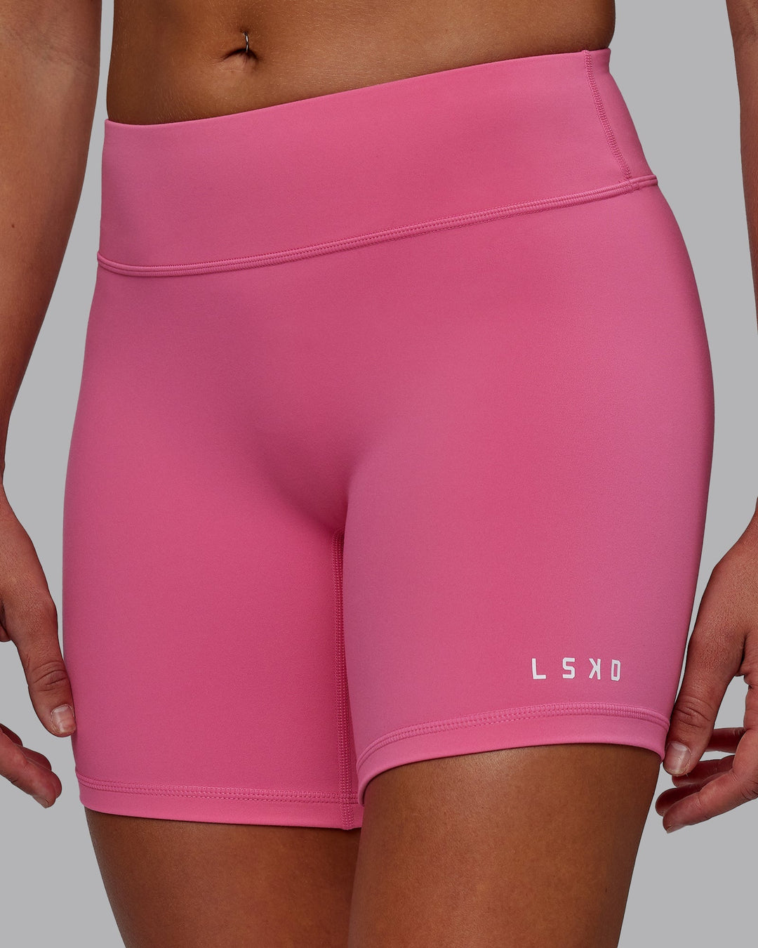 Woman wearing RXD Low-Rise 6" Short - Carmine Rose