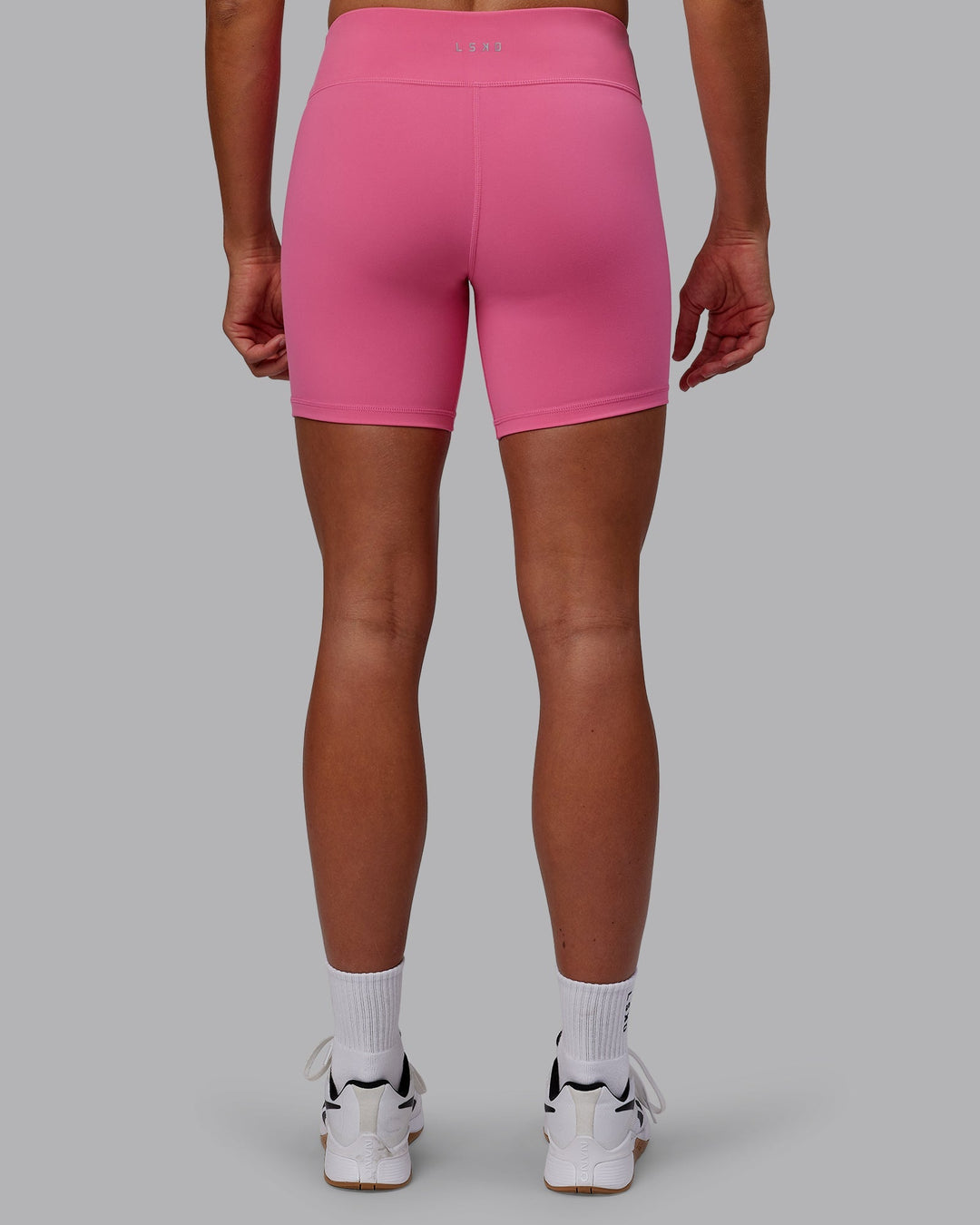 Woman wearing RXD Low-Rise 6" Short - Carmine Rose