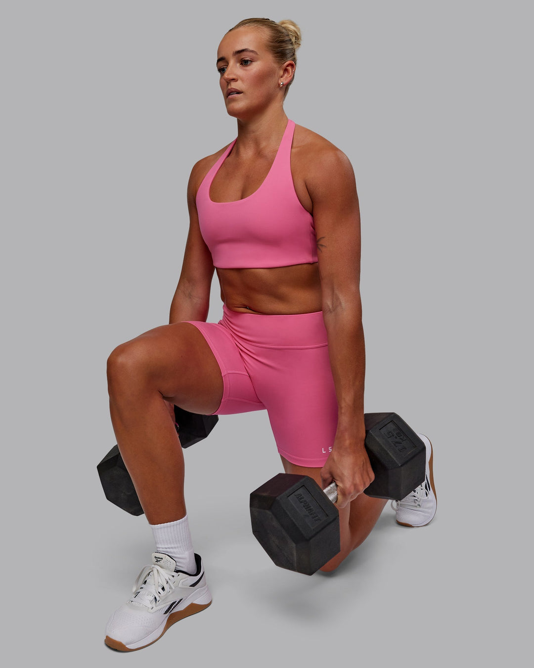 Woman wearing RXD Low-Rise 6" Short - Carmine Rose