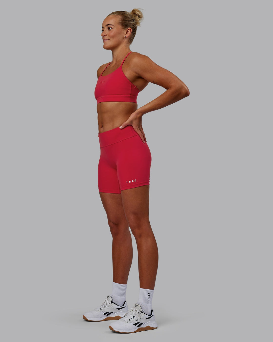 Woman wearing RXD Low-Rise 6" Short - Scarlet