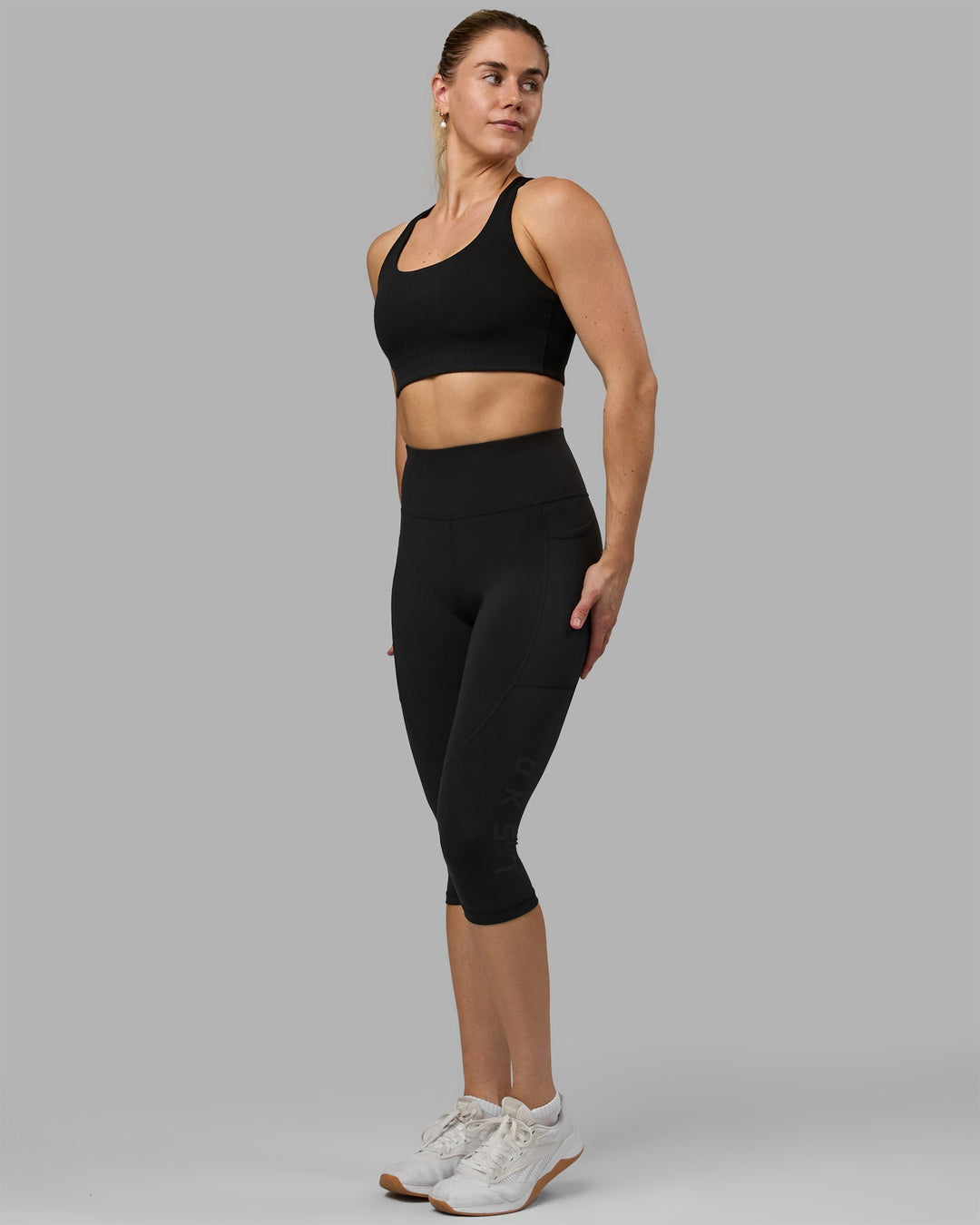 Woman wearing Rep Ultra High-Rise 3/4 Leggings Pockets - Black-Black