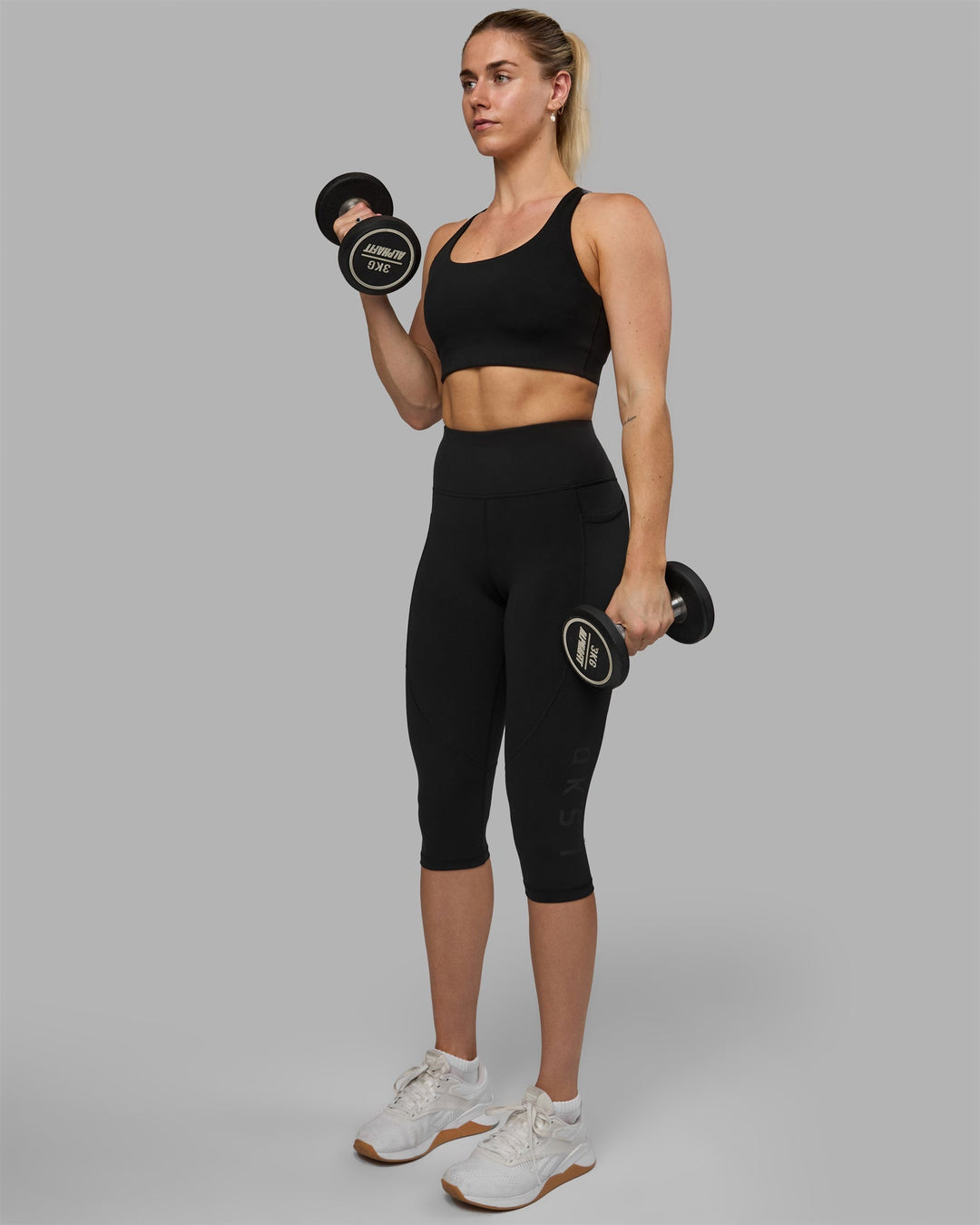 Woman wearing Rep Ultra High-Rise 3/4 Leggings Pockets - Black-Black